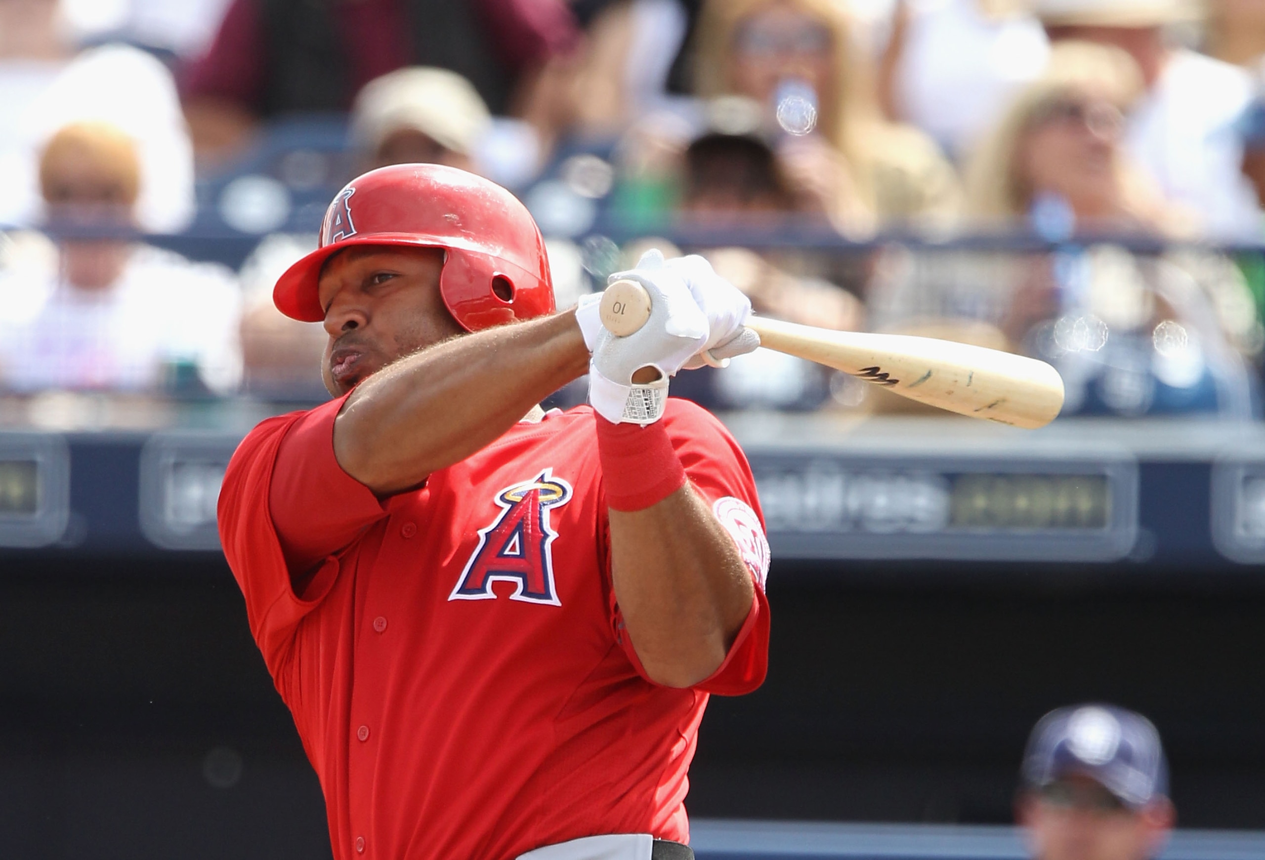 PEORIA, AZ - MARCH 15:  Vernon Wells #10 of the Los Angeles Angels of Anaheim bats against the San Diego Padres during the spring training game at Peoria Stadium on March 15, 2011 in Peoria, Arizona.  (Photo by Christian Petersen/Getty Images)