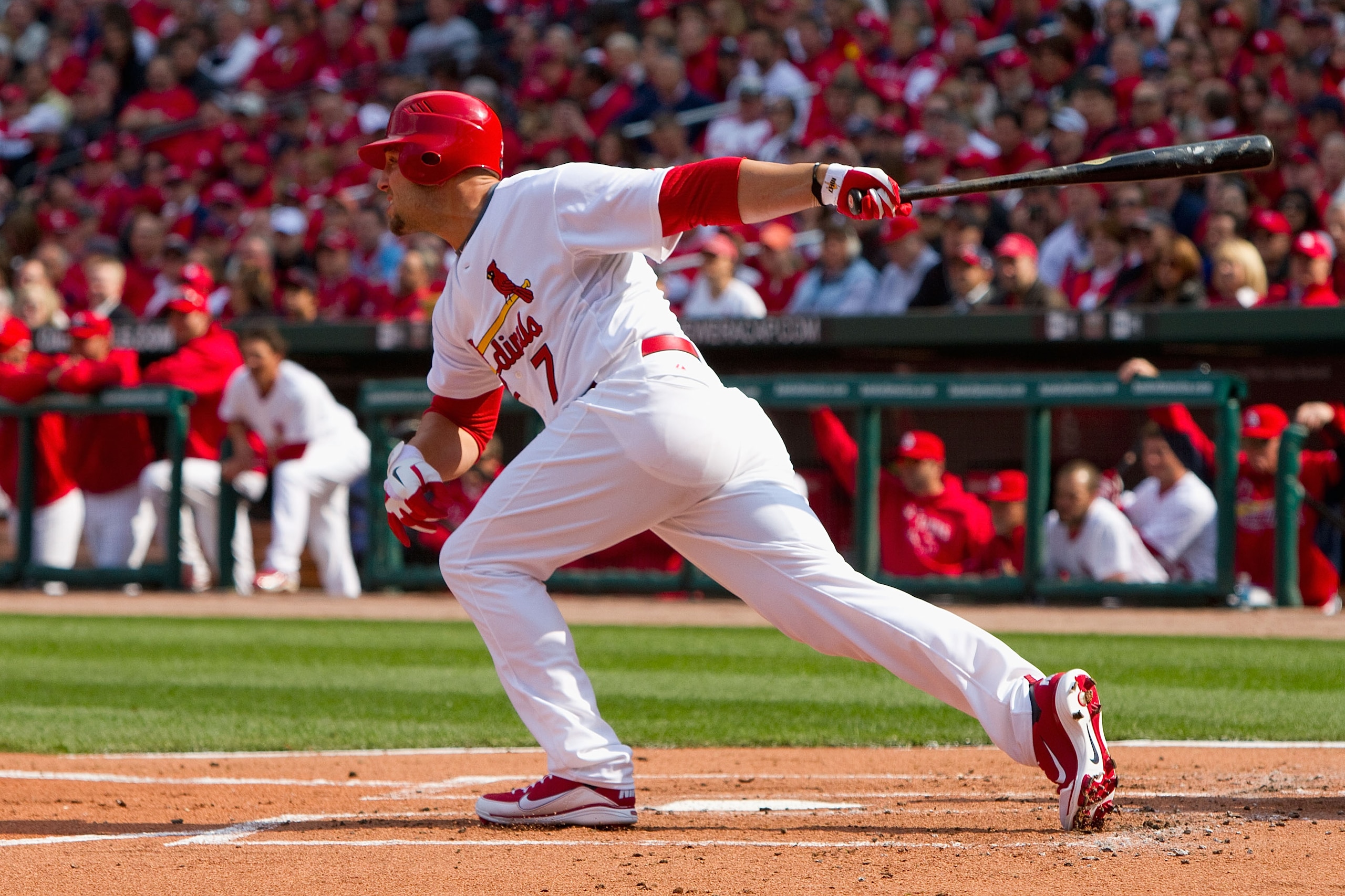 ST. LOUIS, MO - MARCH 31: Matt Holliday #7 of the St. Louis Cardinals hits an RBI single against the San Diego Padres on opening day at Busch Stadium on March 31, 2011 in St. Louis, Missouri.  (Photo by Dilip Vishwanat/Getty Images)