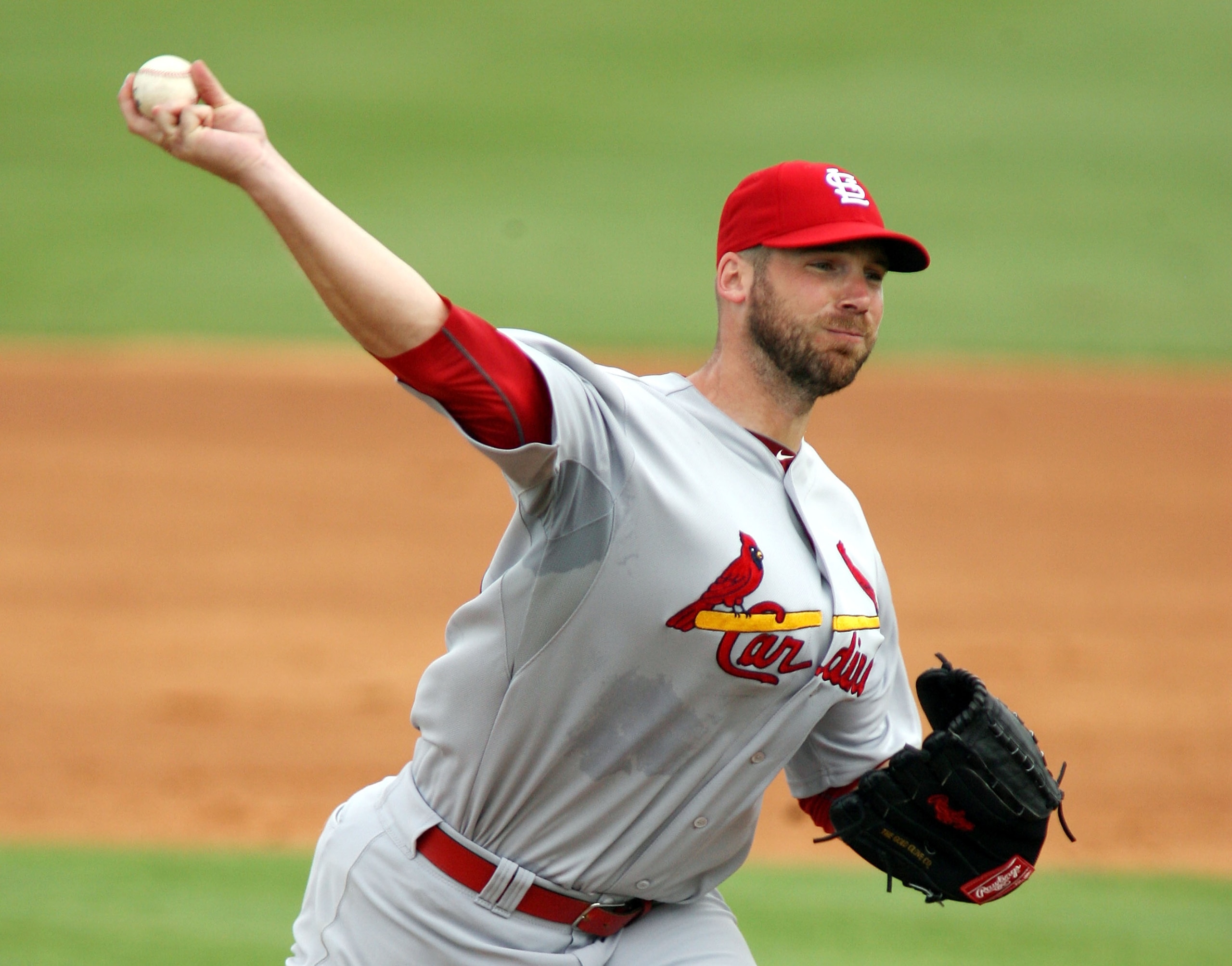 JUPITER, FL - MARCH 01:  Pitcher Chris Carpenter #29 of the St. Louis Cardinals throws against the Florida Marlins at Roger Dean Stadium on March 1, 2011 in Jupiter, Florida.  (Photo by Marc Serota/Getty Images)