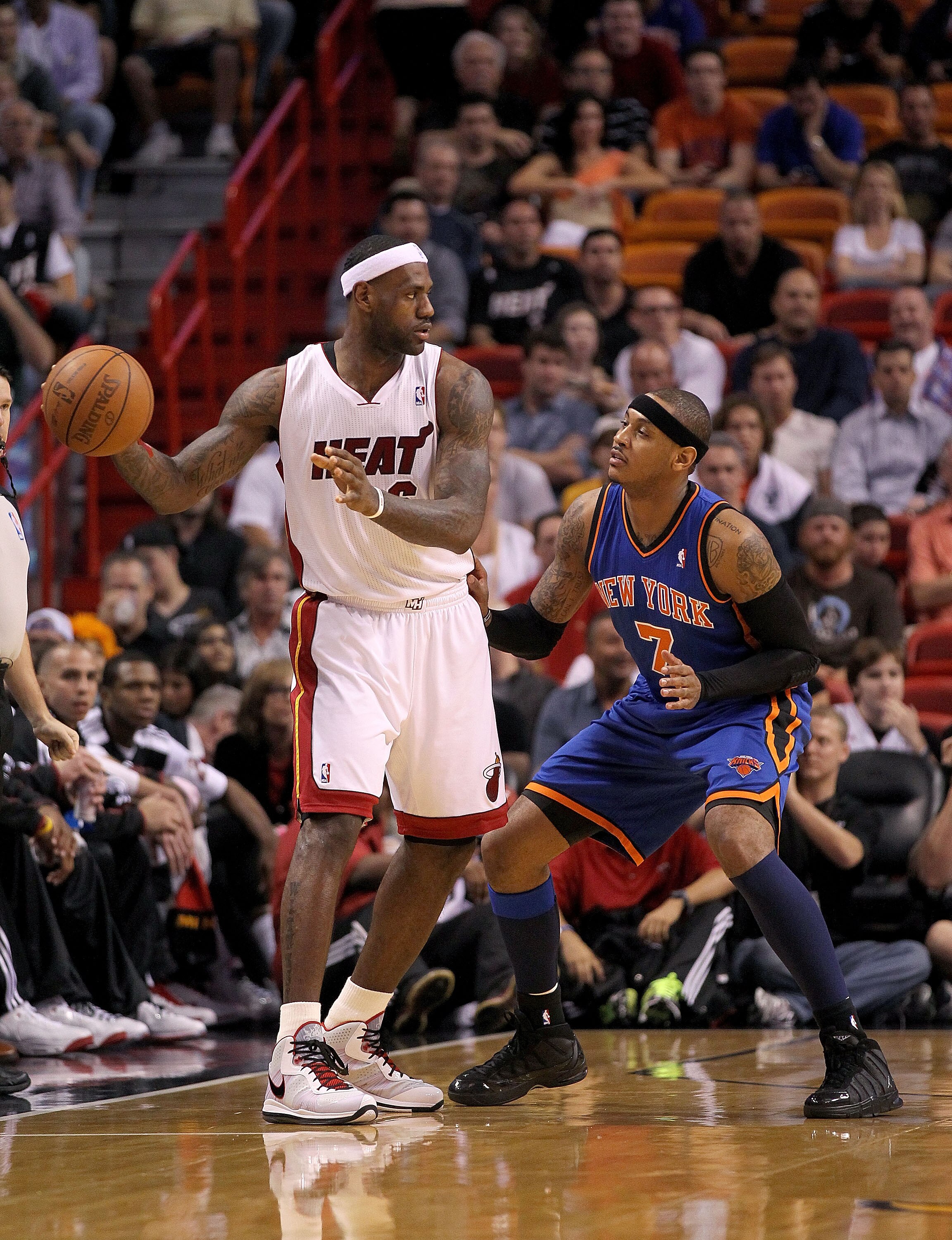 MIAMI, FL - FEBRUARY 27:  LeBron James #6 of the Miami Heat is guarded by Carmelo Anthony #7 of the New York Knicks during a game at American Airlines Arena on February 27, 2011 in Miami, Florida. NOTE TO USER: User expressly acknowledges and agrees that,
