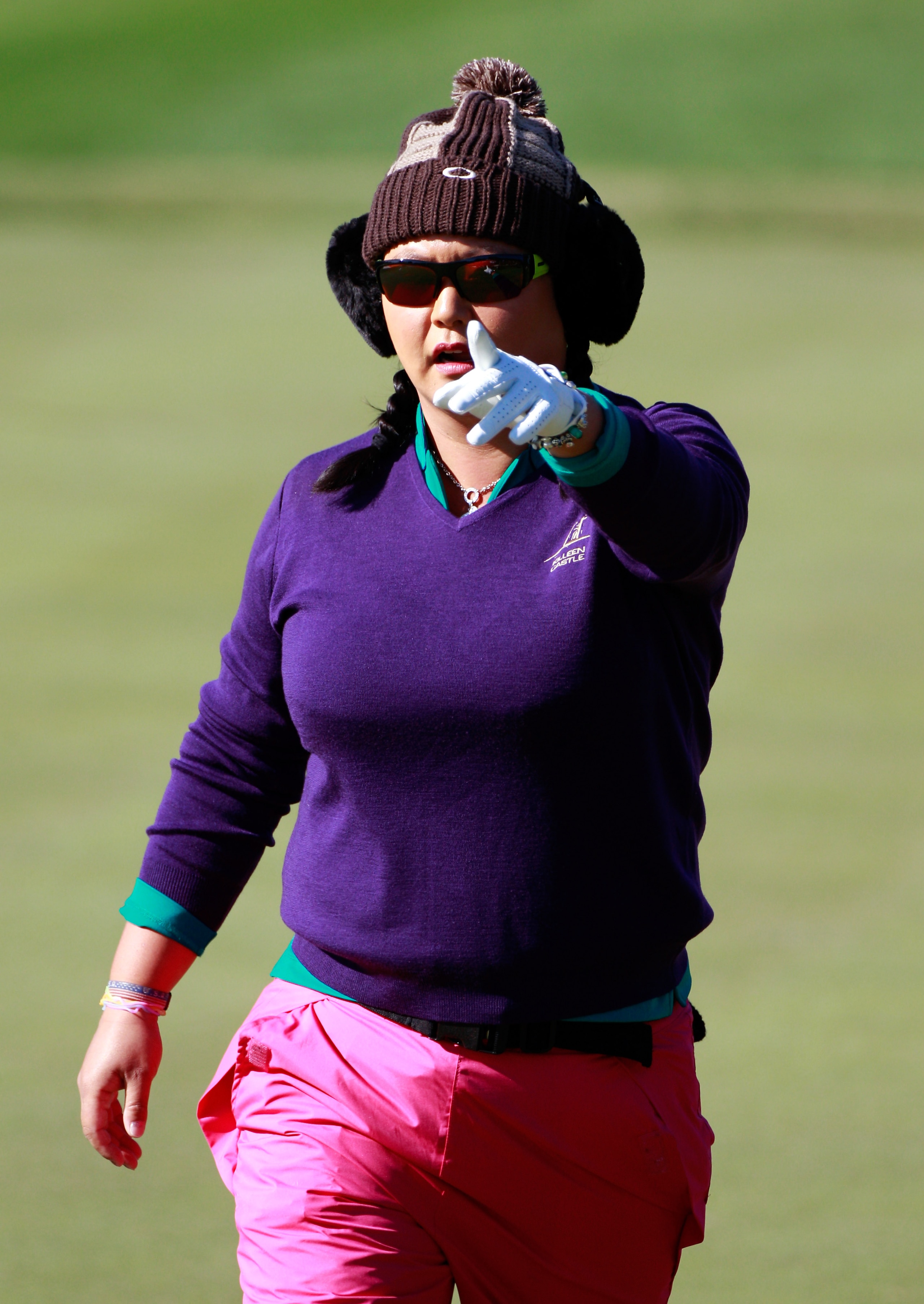ORLANDO, FL - DECEMBER 02:  Christina Kim points on the 8th hole during the first round of the LPGA Tour Championship at Grand Cypress Resort on December 2, 2010 in Orlando, Florida.  (Photo by Sam Greenwood/Getty Images)
