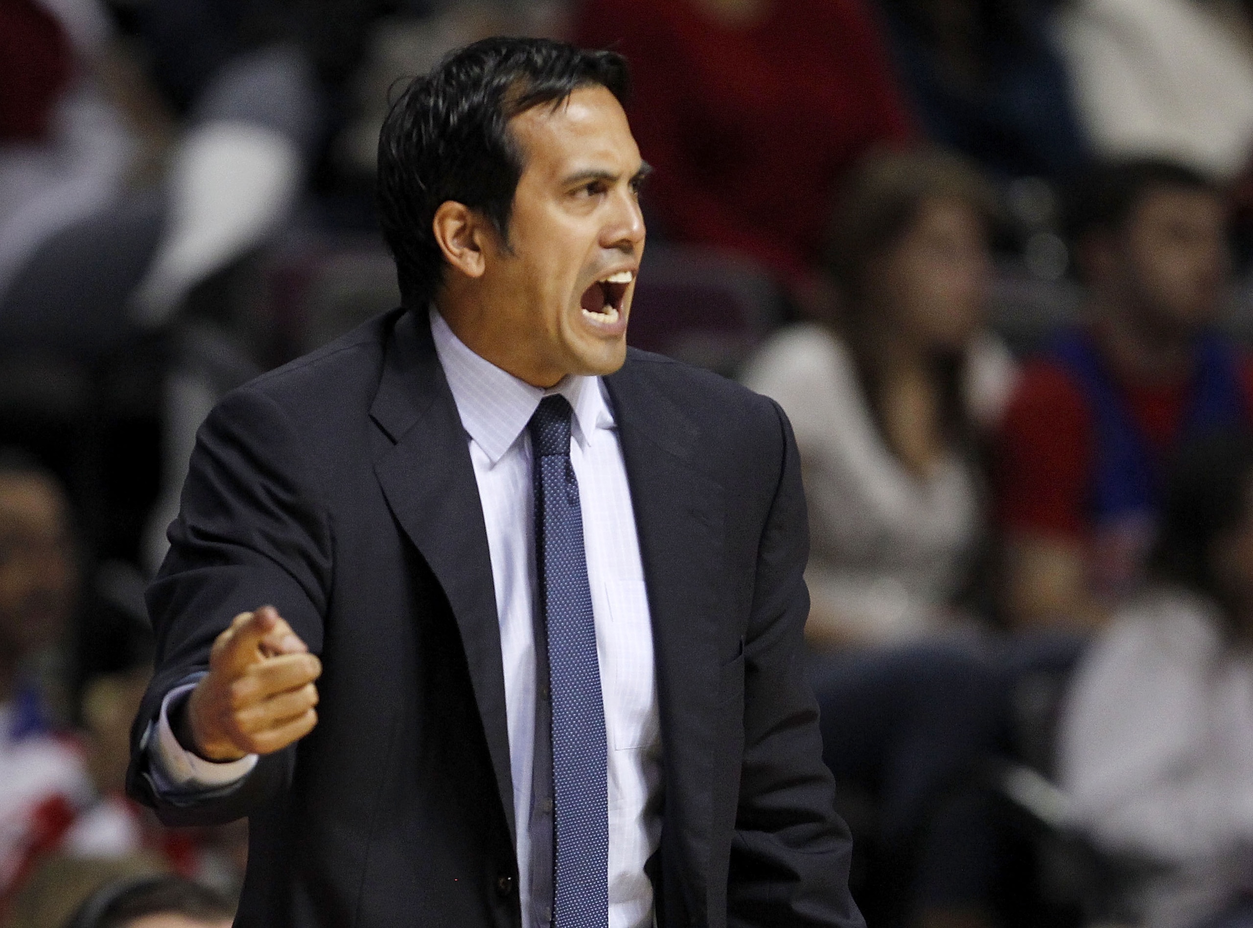 AUBURN HILLS, MI - MARCH 23:  Head coach Erik Spoelstra of the Miami Heat yells from the bench while playing the Detroit Pistons at The Palace of Auburn Hills on March 23, 2011 in Auburn Hills, Michigan. Miami won the game 100-94. NOTE TO USER: User expre