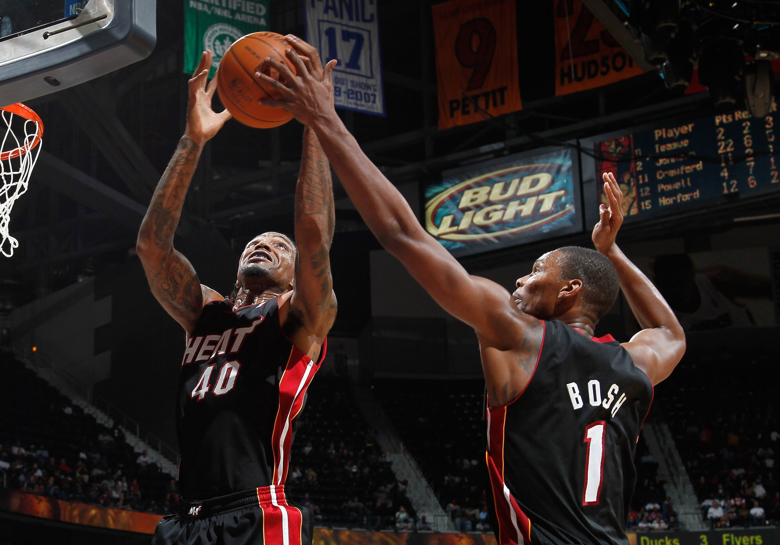 ATLANTA - OCTOBER 21:  Chris Bosh #1 and Udonis Haslem #40 of the Miami Heat against the Atlanta Hawks at Philips Arena on October 21, 2010 in Atlanta, Georgia.  (Photo by Kevin C. Cox/Getty Images)