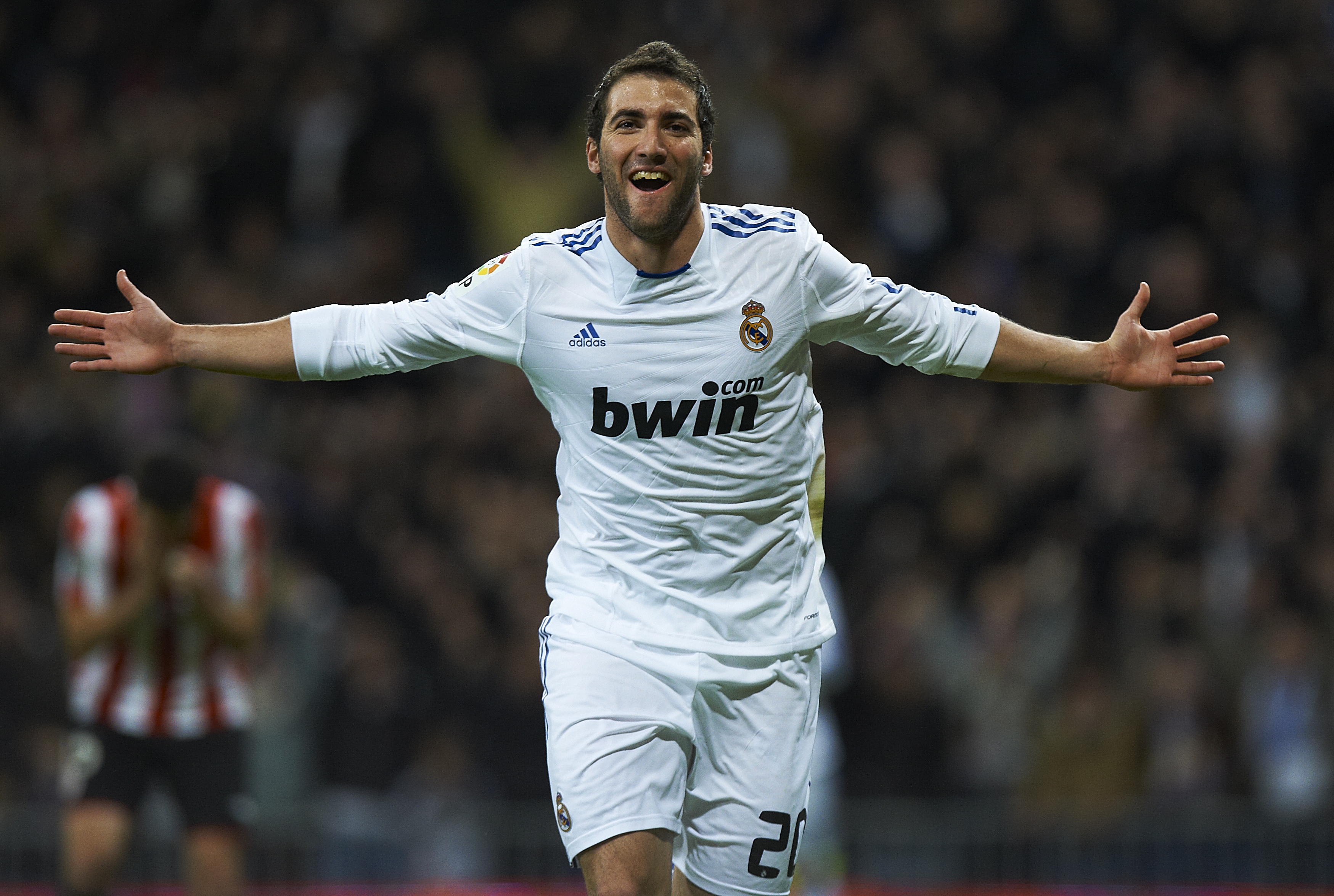 MADRID, SPAIN - NOVEMBER 20:  Gonzalo Higuain of Real Madrid celebrates after scoring the 1-0 during the la liga match between Real Madrid and Athletic Bilbao at Estadio Santiago Bernabeu on November 20, 2010 in Madrid, Spain.  (Photo by Manuel Queimadelo