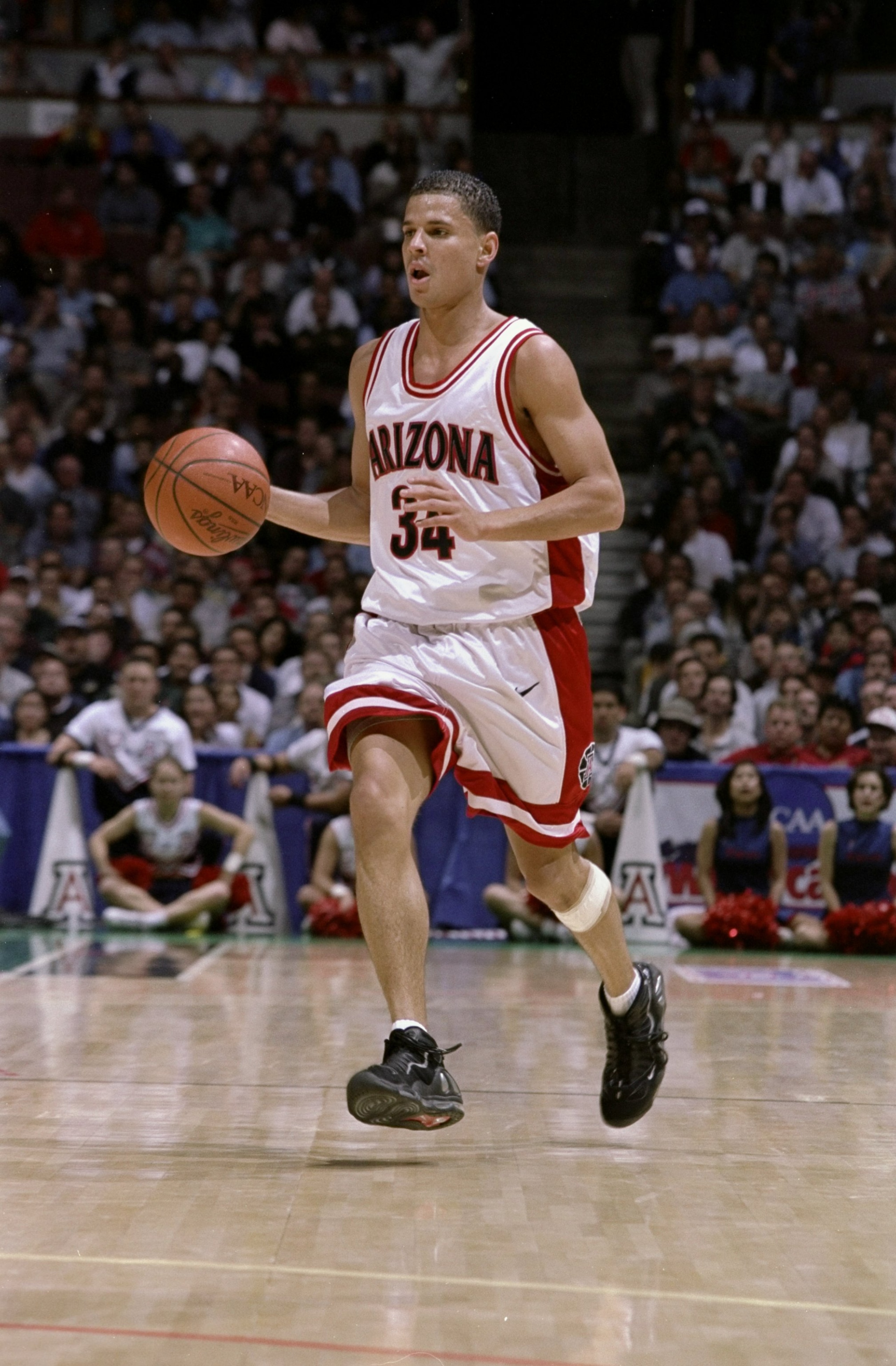 19 Mar 1998:  Guard Miles Simon of the Arizona Wildcats in action against the Maryland Terrapins during an NCAA tournament game at Arrowhead Pond in Anaheim, California.  Arizona defeated Maryland 87-73. Mandatory Credit: Todd Warshaw  /Allsport
