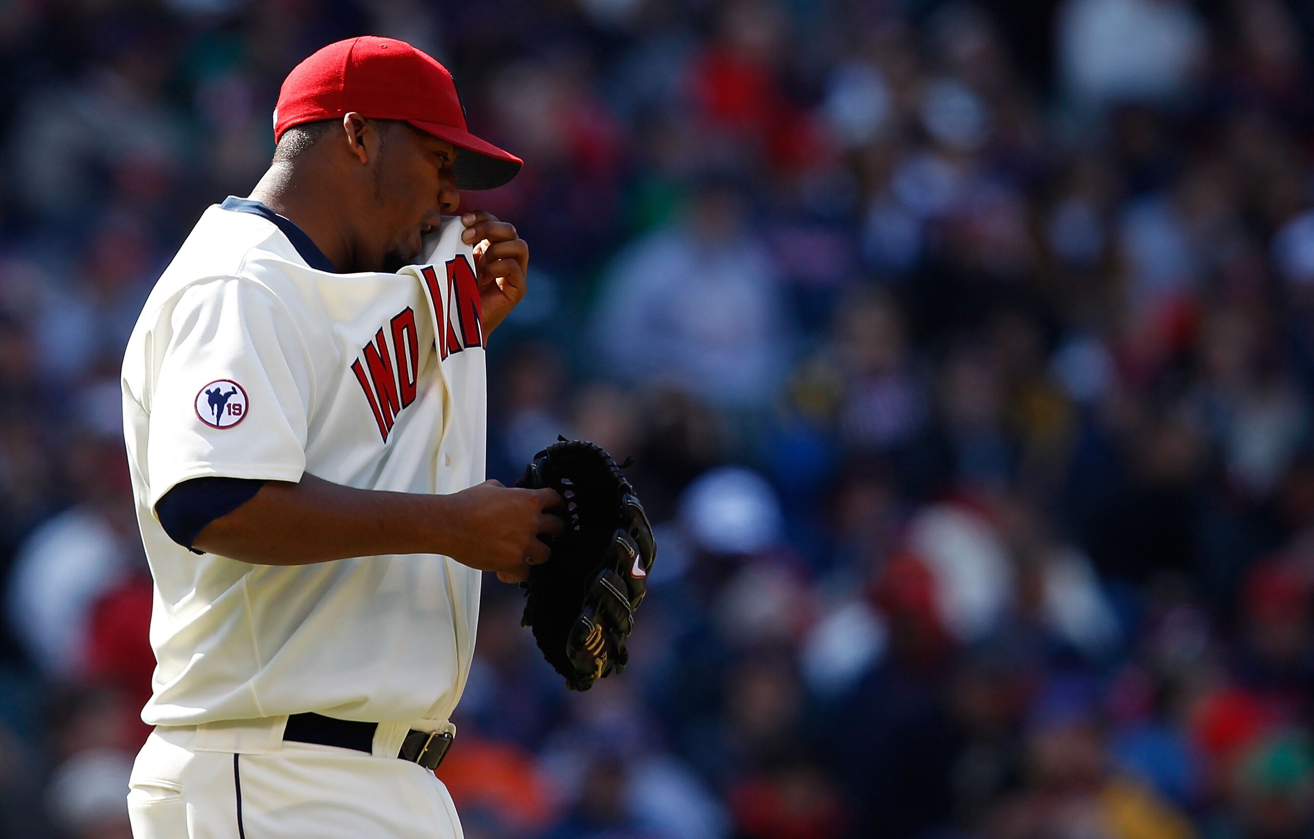 CLEVELAND - APRIL 01:  Fausto Carmona #55 of the Cleveland Indians takes a break inbetween pitches against the Chicago White Sox during the Opening Day game on April 1, 2011 at Progressive Field in Cleveland, Ohio.  (Photo by Jared Wickerham/Getty Images)