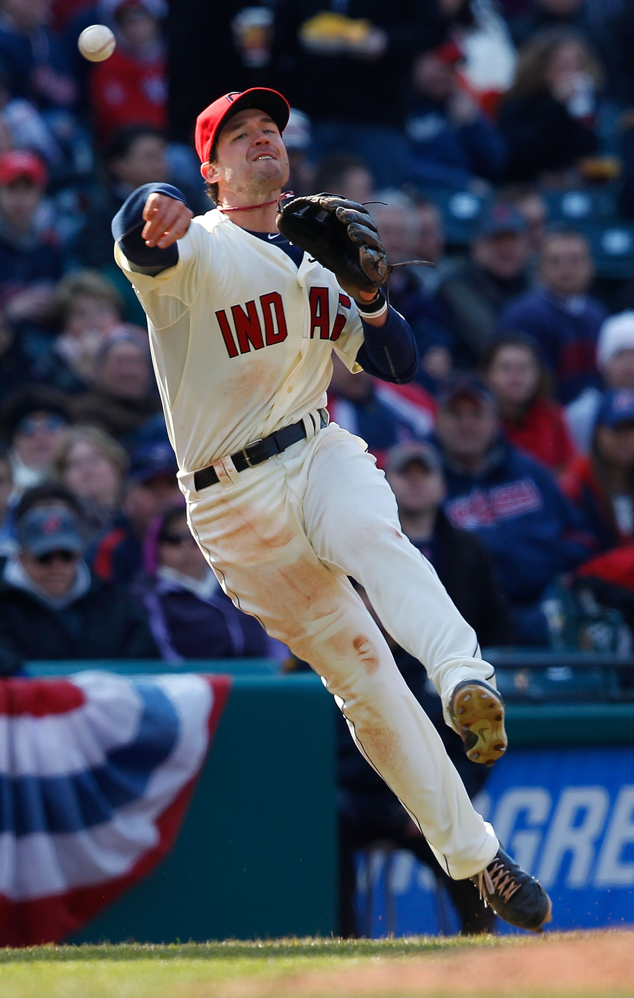 CLEVELAND - APRIL 01:  Jack Hannahan #9 of the Cleveland Indians throws the ball to first base during the Opening Day game against the Chicago White Sox on April 1, 2011 at Progressive Field in Cleveland, Ohio.  (Photo by Jared Wickerham/Getty Images)