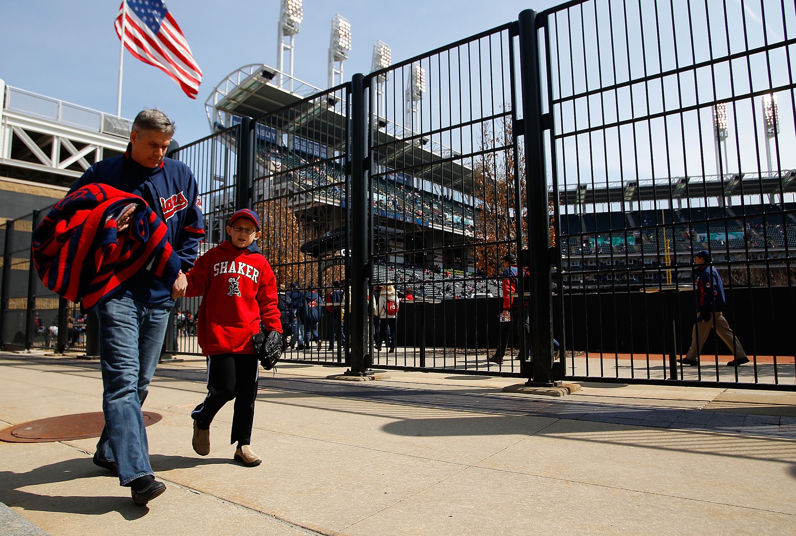 CLEVELAND - APRIL 01:  Fans walk into Progressive Field stadium prior to the Opening Day game between the Cleveland Indians and the Chicago White Sox on April 1, 2011 at Progressive Field in Cleveland, Ohio.  (Photo by Jared Wickerham/Getty Images)