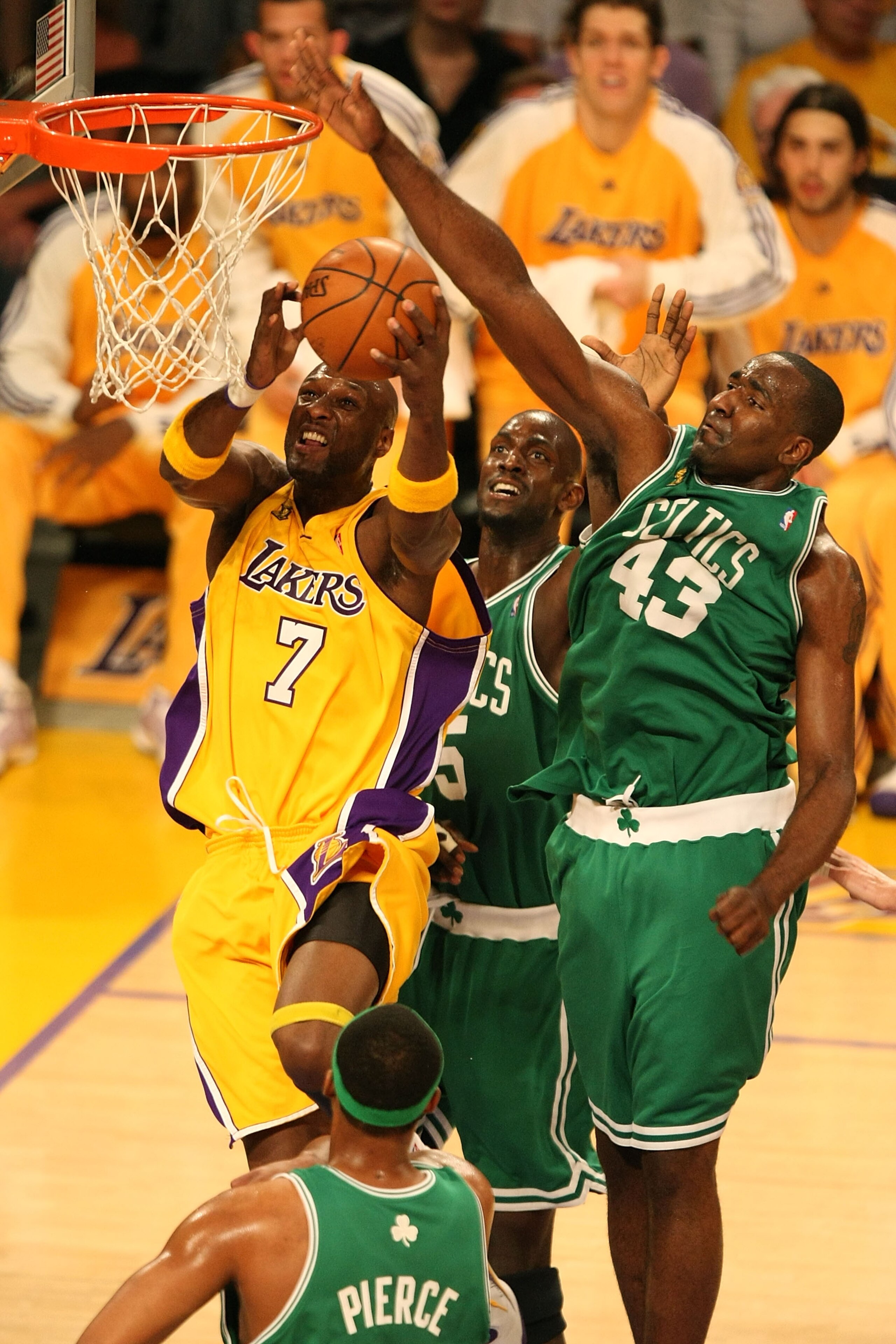 LOS ANGELES, CA - JUNE 12:  Lamar Odom #7 of the Los Angeles Lakers goes up for a shot between Kevin Garnett #5 and Kendrick Perkins #43 of the Boston Celtics in Game Four of the 2008 NBA Finals on June 12, 2008 at Staples Center in Los Angeles, Californi