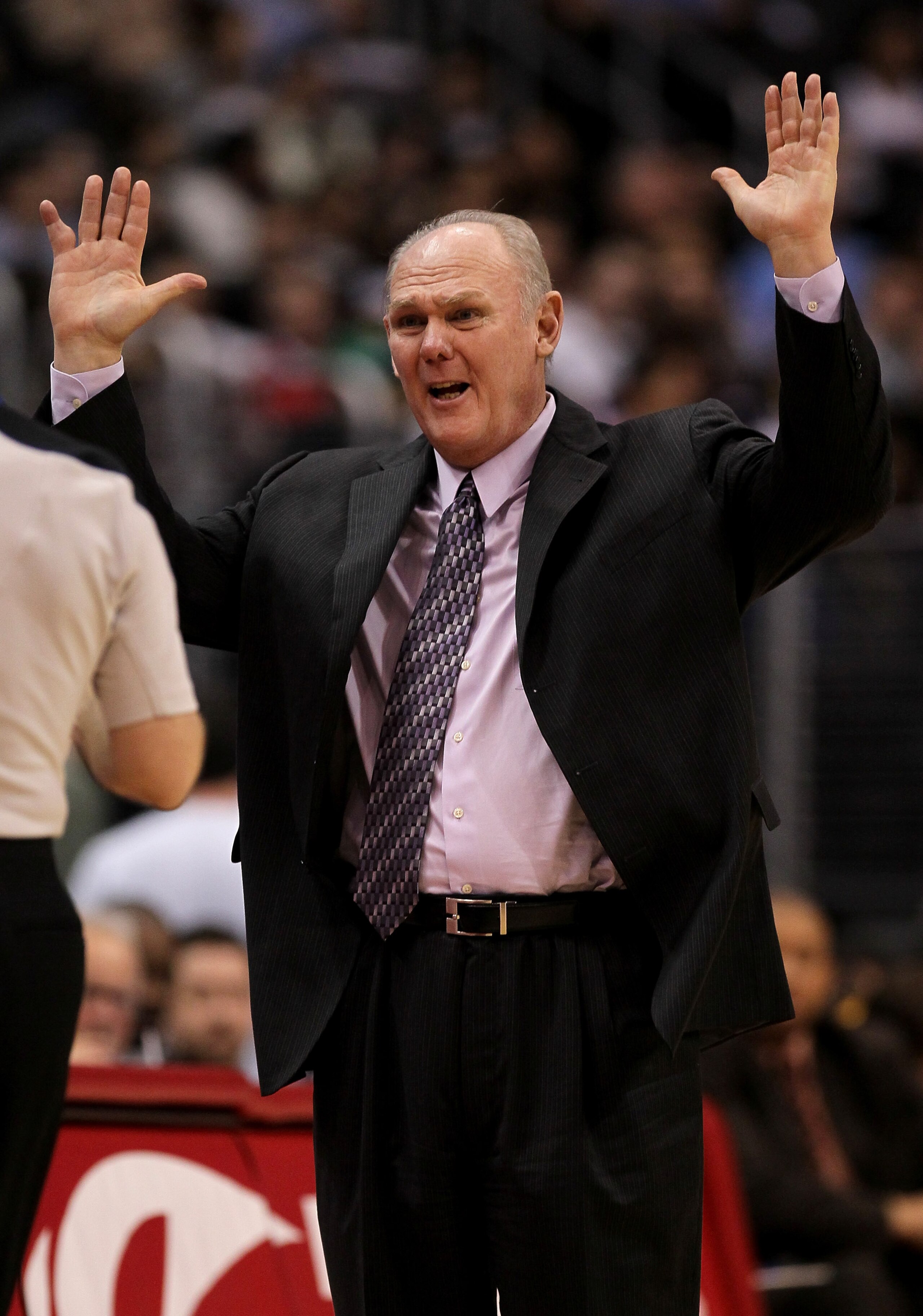 LOS ANGELES, CA - MARCH 5:  Head coach George Karl of the Denver Nuggets complains to an official duirng the game with the Los Angeles Clippers at Staples Center on March 5, 2011 in Los Angeles, California.  NOTE TO USER: User expressly acknowledges and a