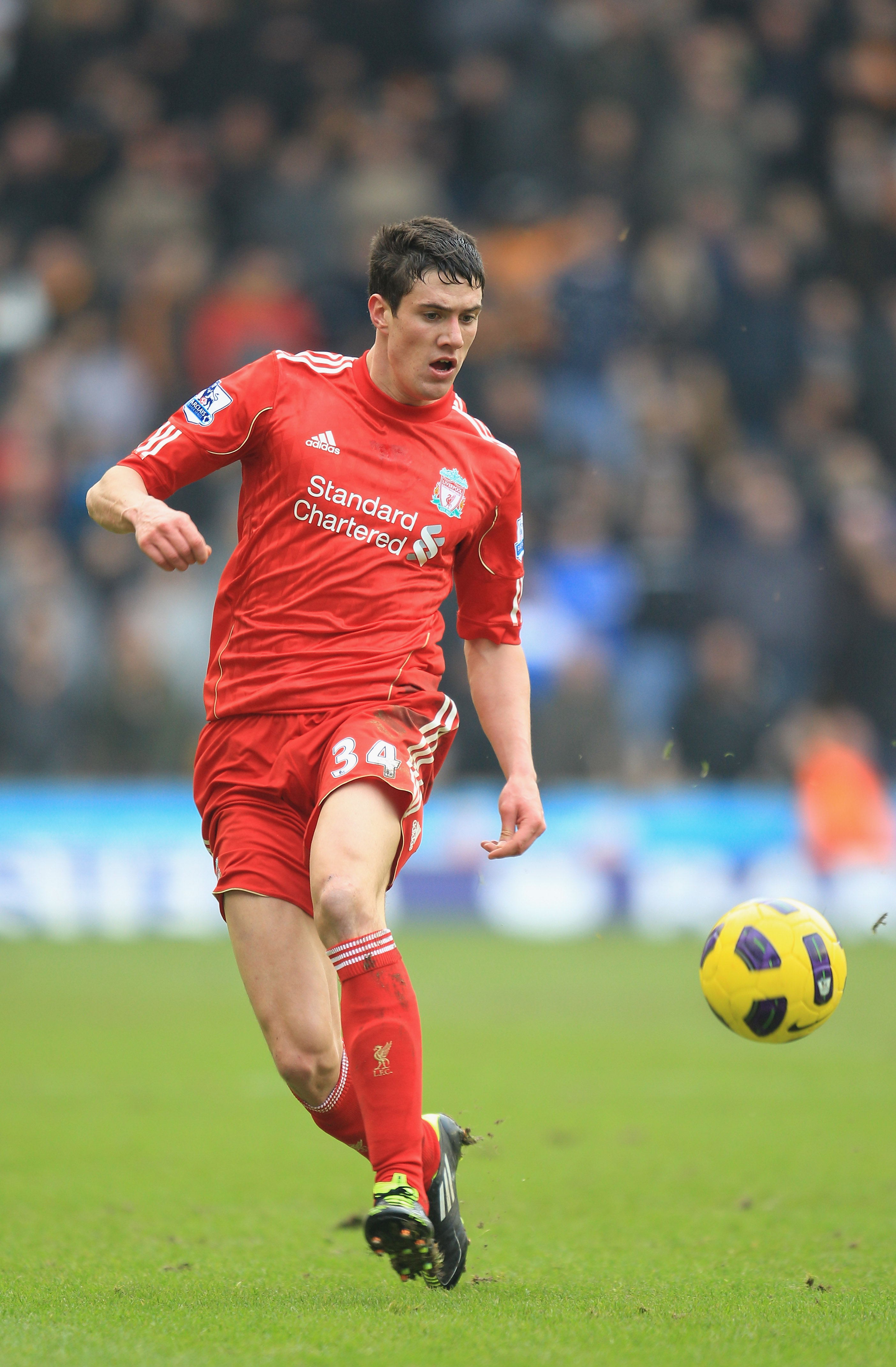 WOLVERHAMPTON, ENGLAND - JANUARY 22:    Martin Kelly of Liverpool in action during the Barclays Premier League match between Wolverhampton Wanderers and Liverpool at Molineux on January 22, 2011 in Wolverhampton, England.  (Photo by Mark Thompson/Getty Im