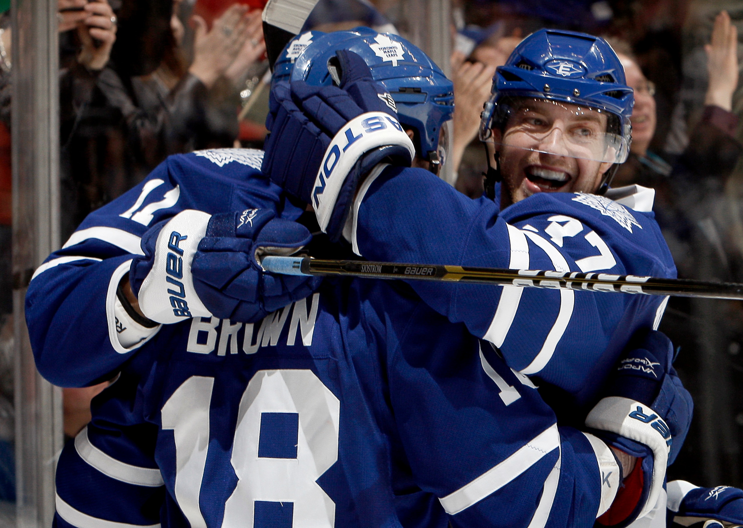 TORONTO, CANADA - MARCH 19 Tim Brent #37 and Mike Brown #18 of the Toronto Maple Leafs celebrate Mike Brown goal against the Boston Bruins during game action at the Air Canada Centre March 19, 2011 in Toronto, Ontario, Canada. (Photo by Abelimages/Getty TORONTO, CANADA - MARCH 19 Tim Brent #37 and Mike Brown #18 of the Toronto Maple Leafs celebrate Mike Brown goal against the Boston Bruins during game action at the Air Canada Centre March 19, 2011 in Toronto, Ontario, Canada. (Photo by Abelimages/Getty