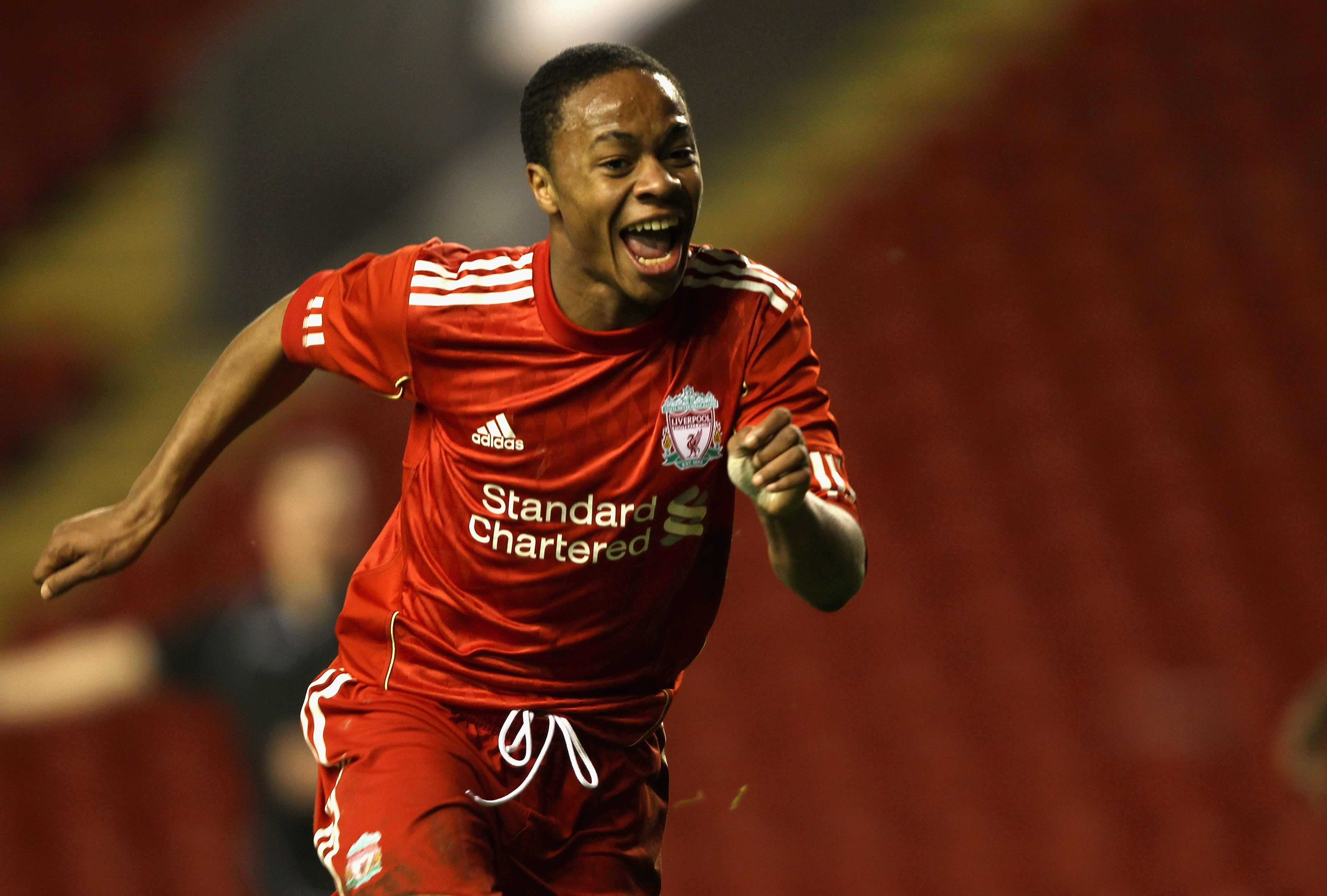 LIVERPOOL, ENGLAND - FEBRUARY 14:  Raheem Sterling of Liverpool celebrates after scoring his first goal during the FA Youth Cup match between Liverpool and Southend United at Anfield on February 14, 2011 in Liverpool, England.  (Photo by Clive Brunskill/G
