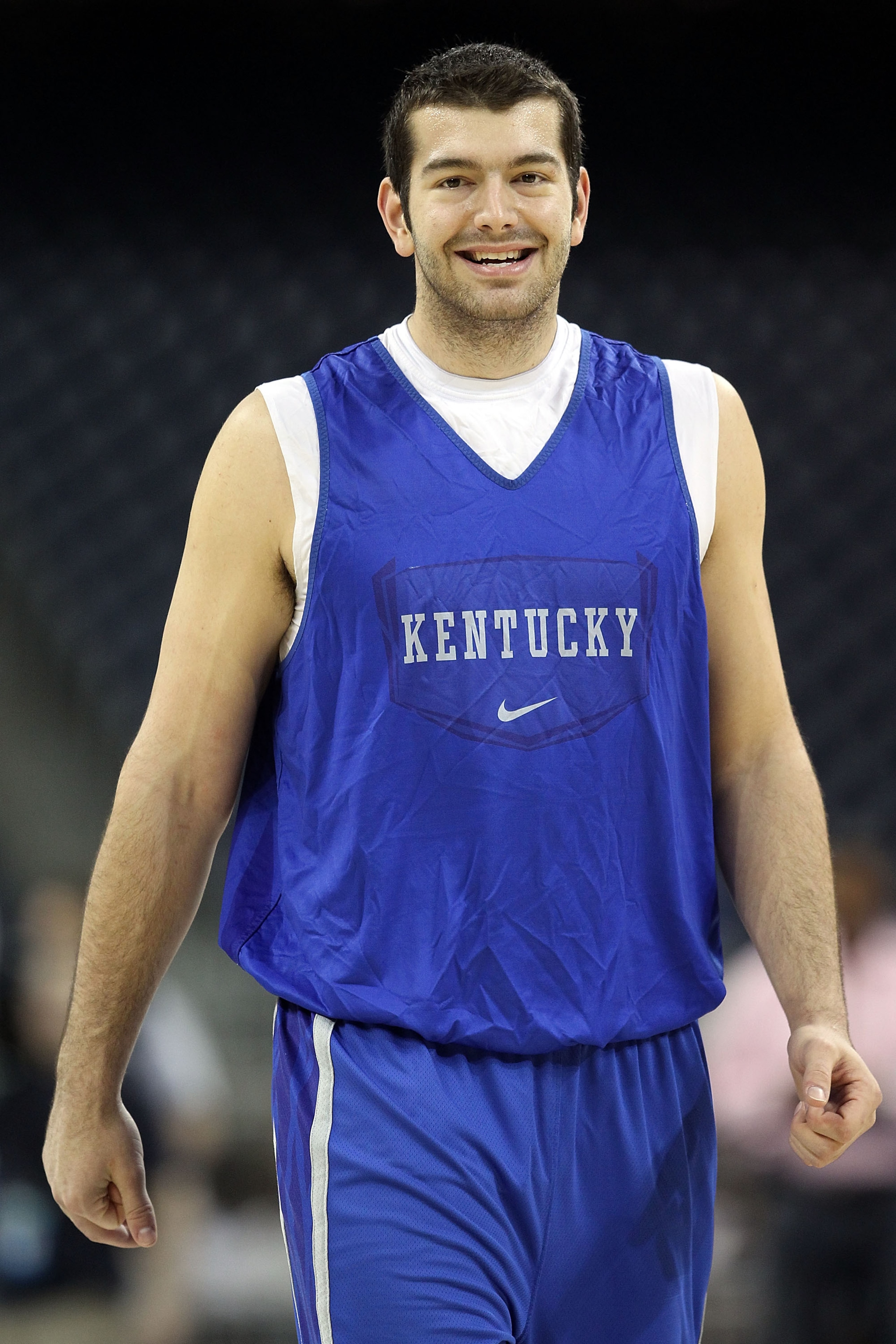 HOUSTON, TX - APRIL 01:  Josh Harrellson #55 of the Kentucky Wildcats smiles during practice prior to the 2011 Final Four of the NCAA Division I Men's Basketball Tournament at Reliant Stadium on April 1, 2011 in Houston, Texas.  (Photo by Andy Lyons/Getty