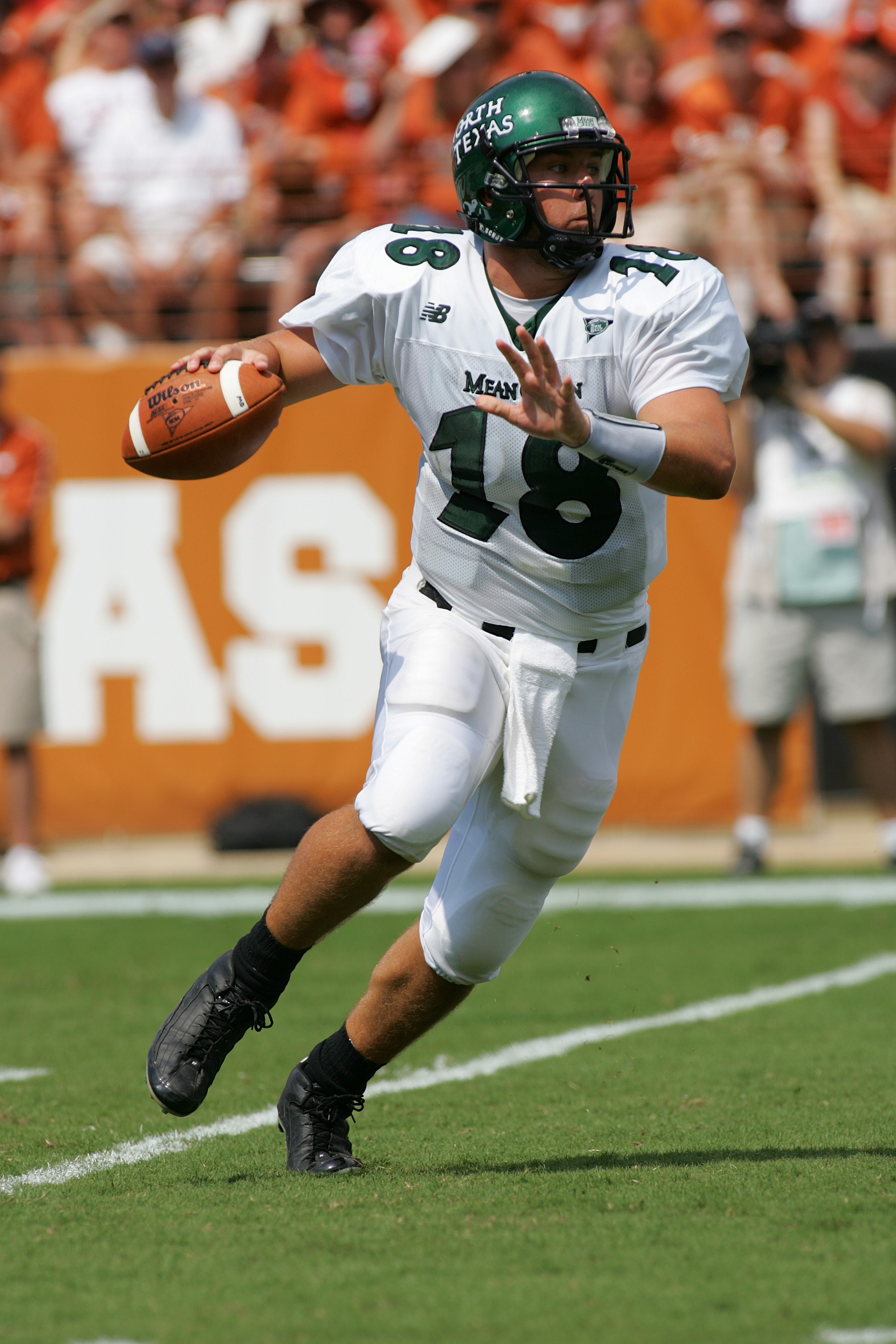 AUSTIN, TX - SEPTEMBER 2:  Quarterback Matt Phillips #18 of the North Texas Eagles looks to pass against the Texas Longhorns on September 2, 2006 at Texas Memorial Stadium in Austin, Texas. The Longhorns defeated the Eagles 56-7. (Photo by Ronald Martinez