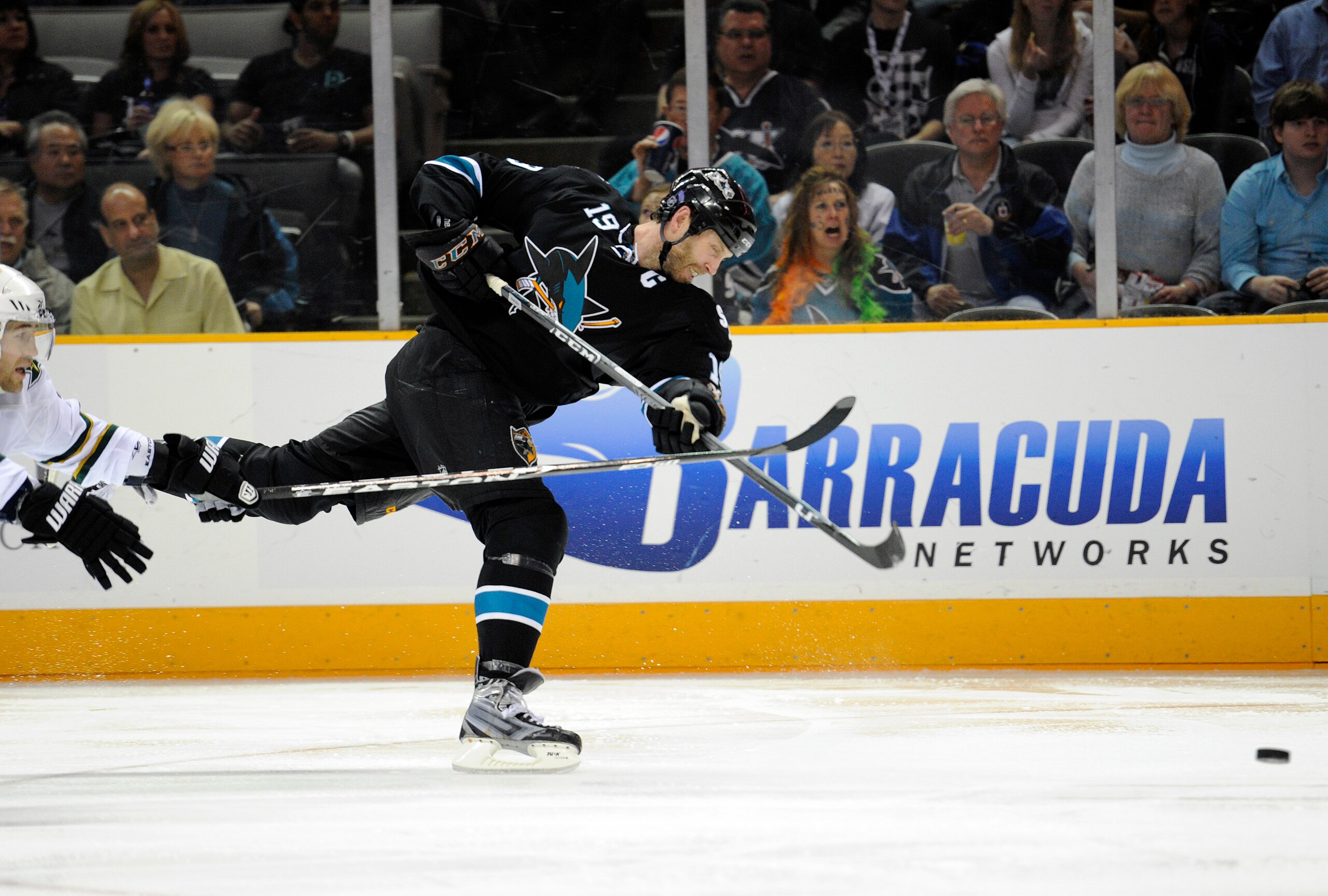 SAN JOSE, CA - MARCH 31: Joe Thornton #19 of the San Jose Sharks shoots on goal against the Dallas Stars in the second period during an NHL hockey game at the HP Pavilion on March 31, 2011 in San Jose, California. (Photo by Thearon W. Henderson/Getty Imag