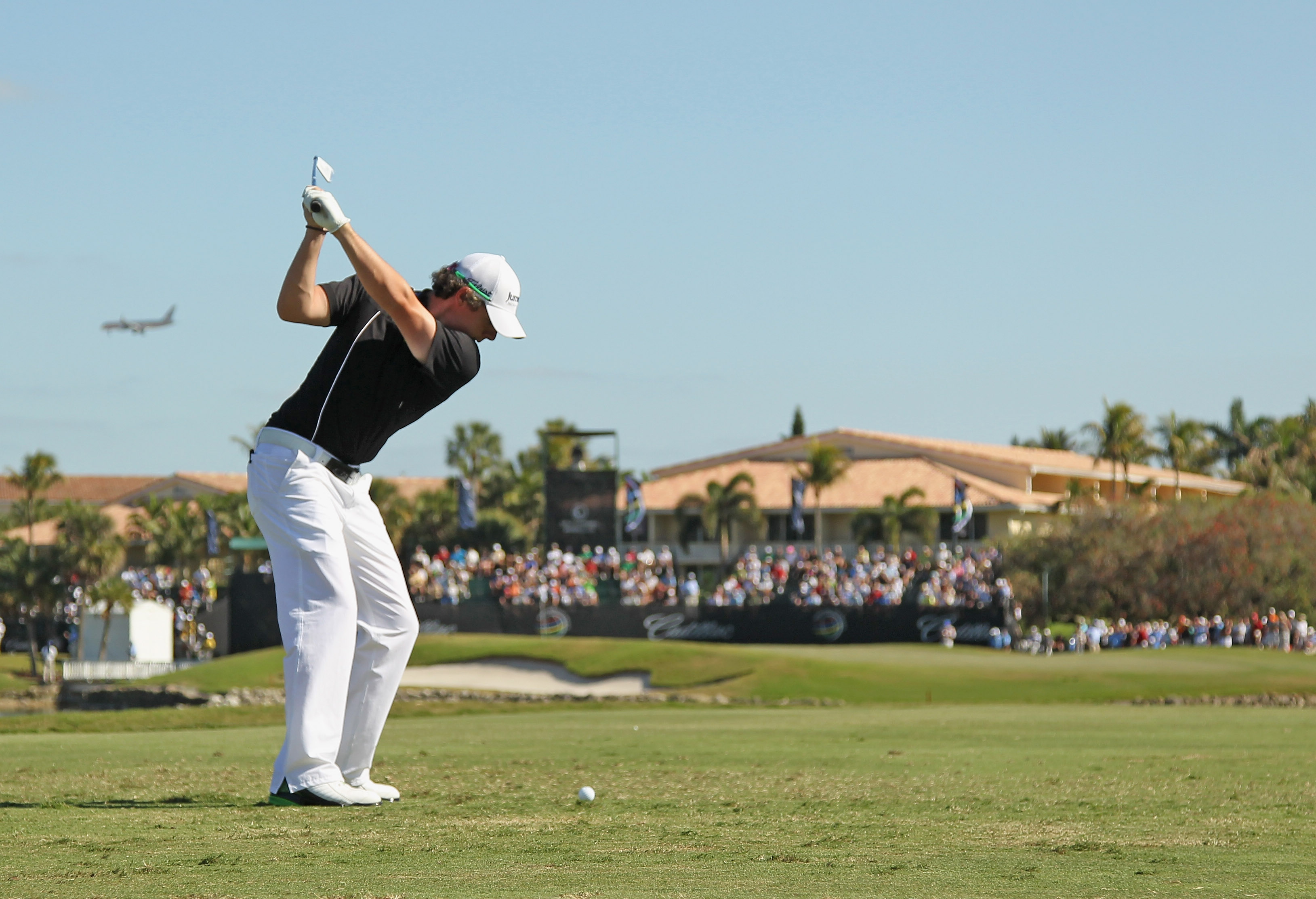 DORAL, FL - MARCH 13:  Rory McIlroy of Northern Ireland hits his tee shot on the ninth hole during the final round of the 2011 WGC- Cadillac Championship at the TPC Blue Monster at the Doral Golf Resort and Spa on March 13, 2011 in Doral, Florida.  (Photo