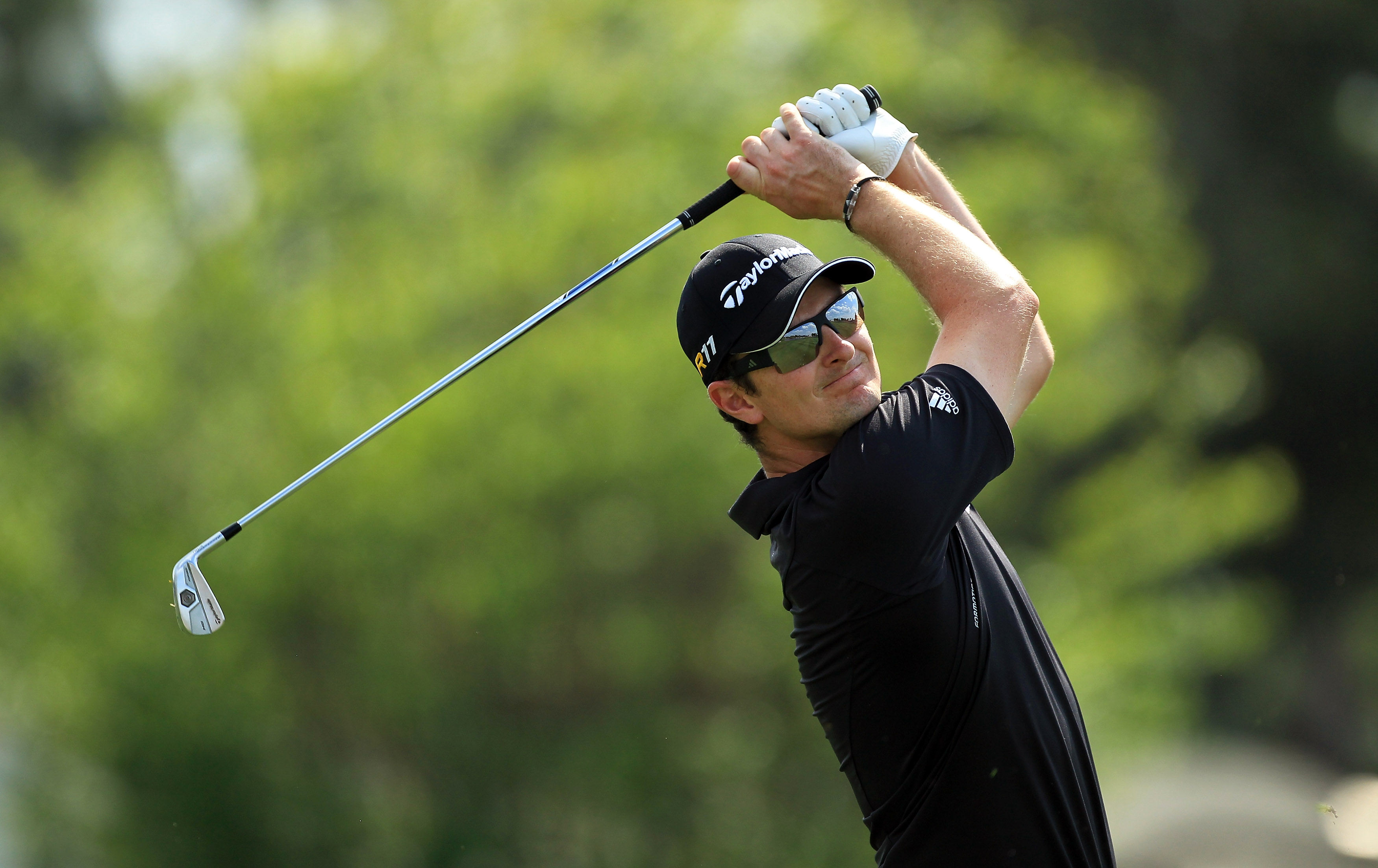ORLANDO, FL - MARCH 27:  Justin Rose of England plays his second shot on the 18th hole during the final round of the 2011 Arnold Palmer Invitational presented by Mastercard at the Bay Hill Lodge and Country Club on March 27, 2011 in Orlando, Florida.  (Ph