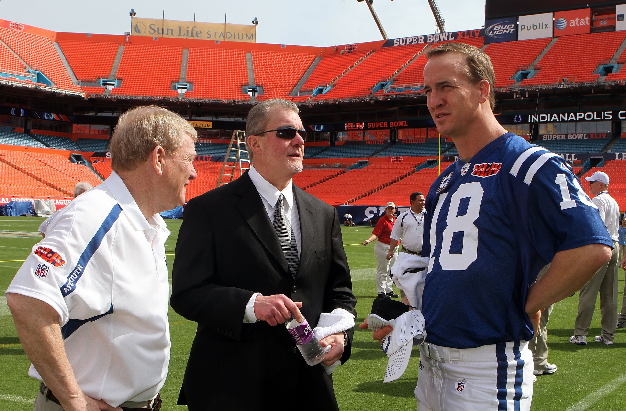MIAMI GARDENS, FL - FEBRUARY 02:  (L-R) General manager Bill Polian, team owner Jim Irsay and Peyton Manning #18 of the Indianapolis Colts look on during Super Bowl XLIV Media Day at Sun Life Stadium on February 2, 2010 in Miami Gardens, Florida.  (Photo