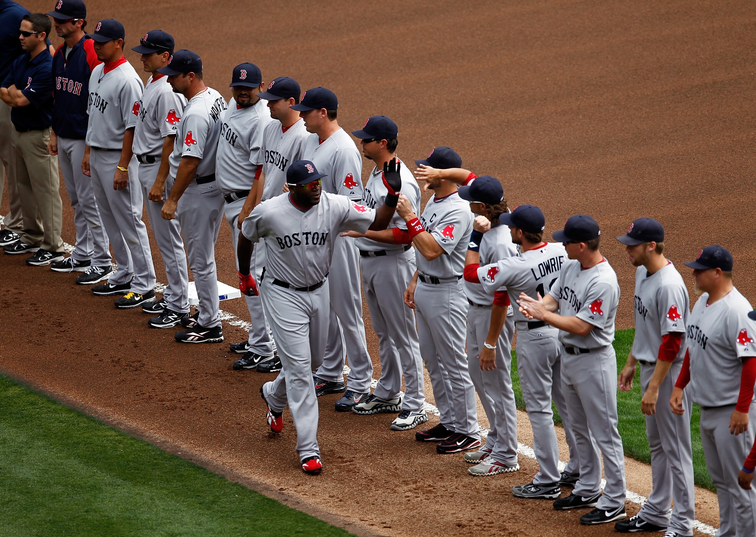 ARLINGTON, TX - APRIL 01:  David Ortiz, of the Boston Red Sox, walks on the field during player introductions on Opening Day against the Texas Rangers at Rangers Ballpark in Arlington on April 1, 2011 in Arlington, Texas.  (Photo by Tom Pennington/Getty I