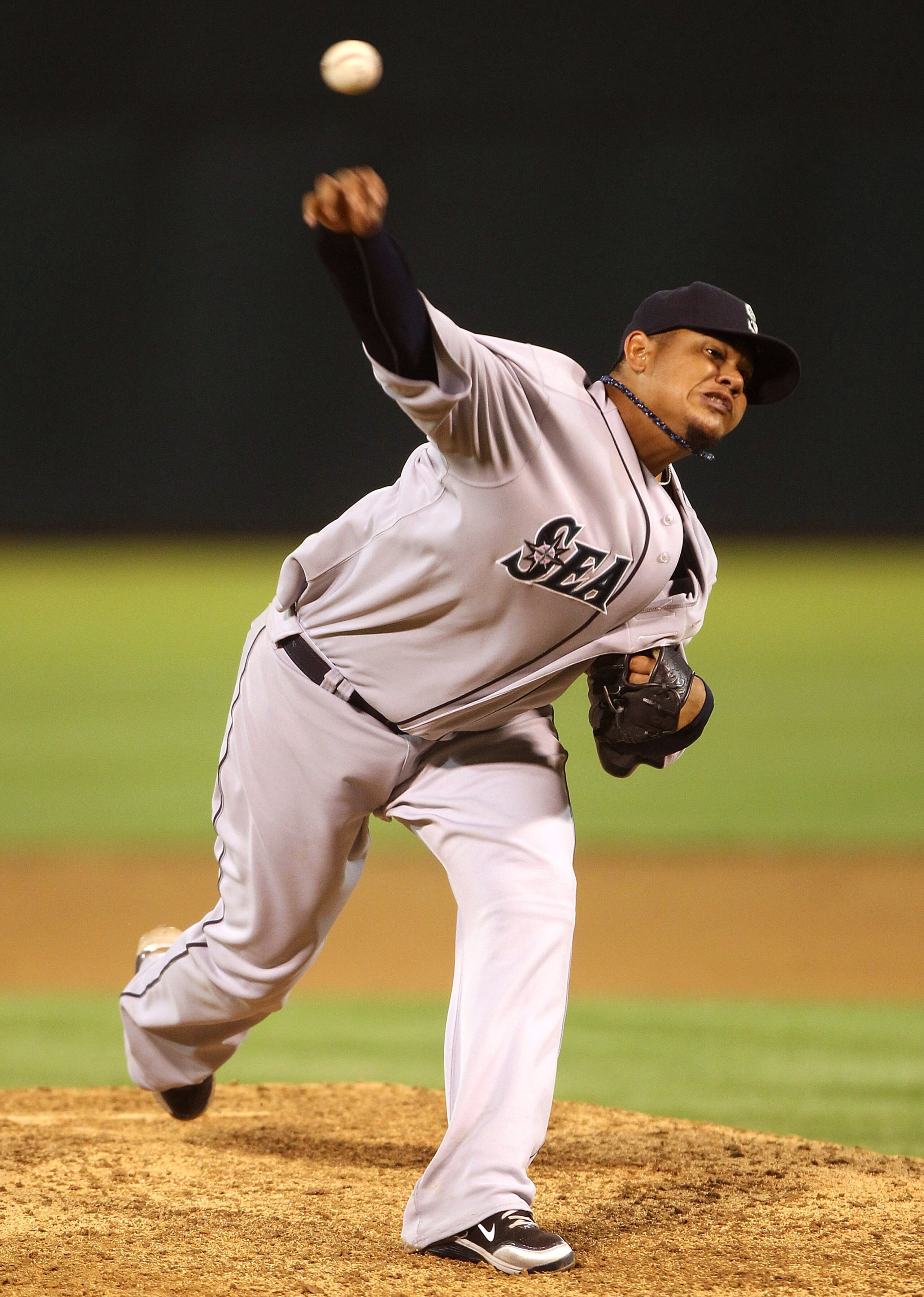 OAKLAND, CA - APRIL 01:  Felix Hernandez #34 of the Seattle Mariners pitches against the Oakland Athletics during an opening day game of Major League Baseball at the Oakland-Alameda County Coliseum on April 1, 2011 in Oakland, California.  (Photo by Jed J
