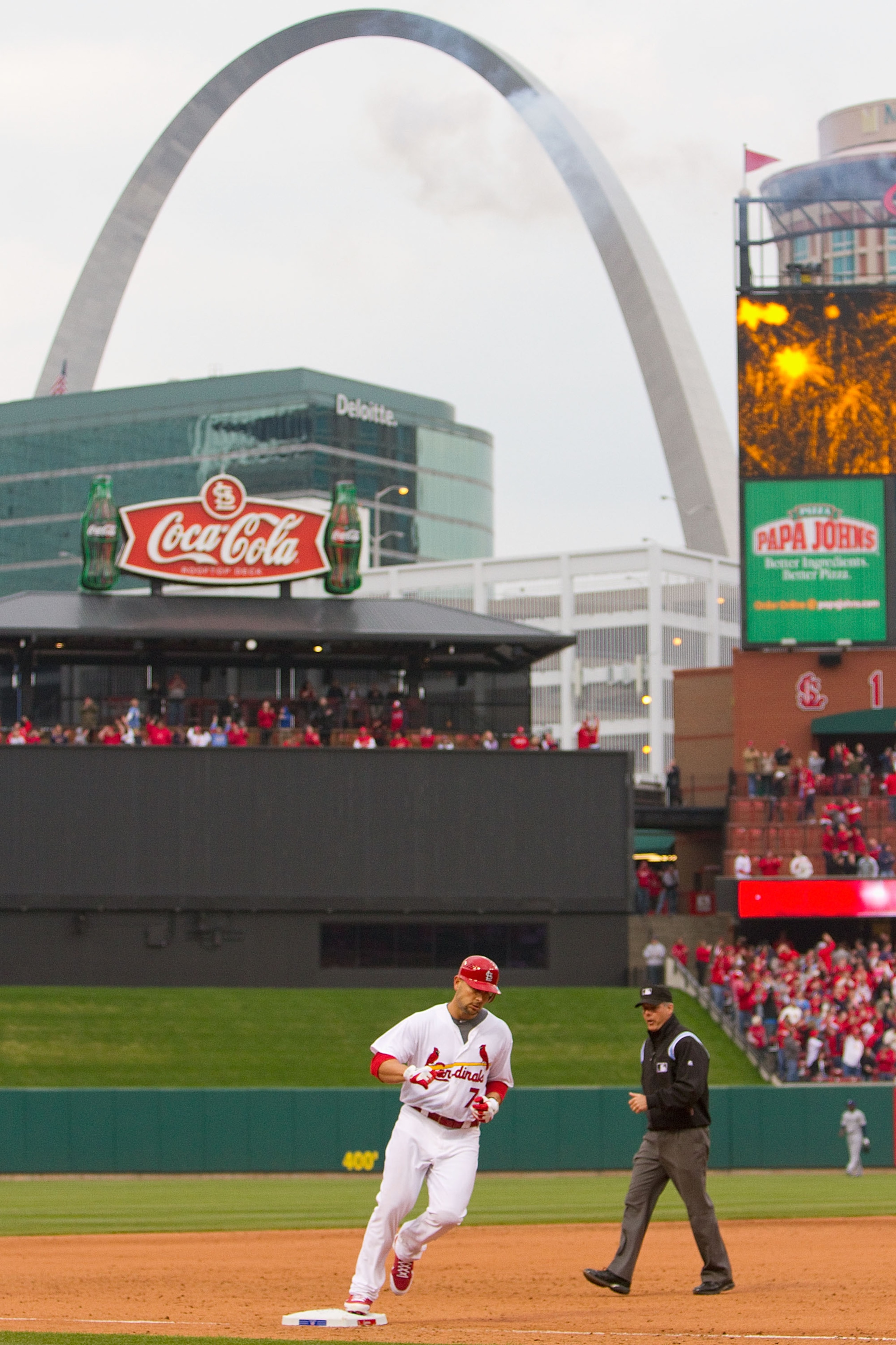 ST. LOUIS, MO - MARCH 31: Matt Holliday #7 of the St. Louis Cardinals rounds third base against the San Diego Padres on opening day at Busch Stadium on March 31, 2011 in St. Louis, Missouri.  (Photo by Dilip Vishwanat/Getty Images)