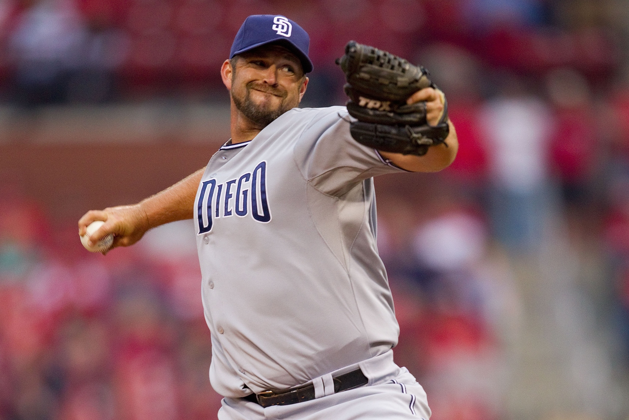 ST. LOUIS, MO - MARCH 31: Reliever Heath Bell #21 of the San Diego Padres pitches against the St. Louis Cardinals on opening day at Busch Stadium on March 31, 2011 in St. Louis, Missouri.  (Photo by Dilip Vishwanat/Getty Images)