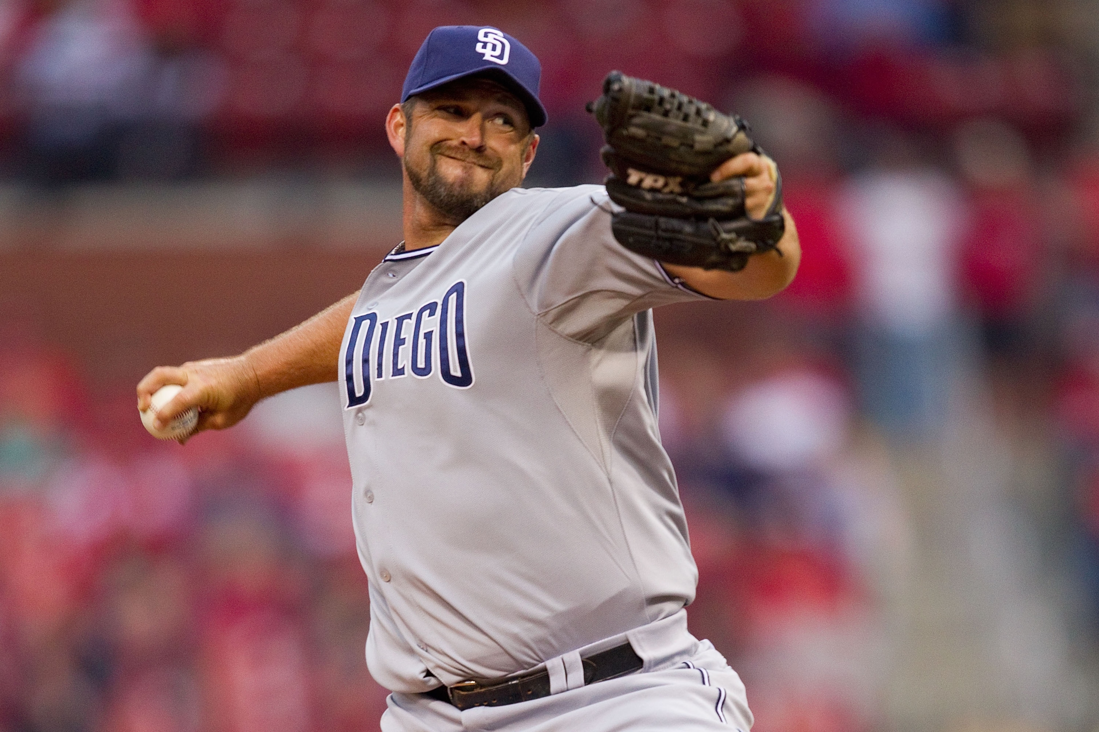 ST. LOUIS, MO - MARCH 31: Reliever Heath Bell #21 of the San Diego Padres pitches against the St. Louis Cardinals on opening day at Busch Stadium on March 31, 2011 in St. Louis, Missouri. (Photo by Dilip Vishwanat/Getty Images) ST. LOUIS, MO - MARCH 31: Reliever Heath Bell #21 of the San Diego Padres pitches against the St. Louis Cardinals on opening day at Busch Stadium on March 31, 2011 in St. Louis, Missouri. (Photo by Dilip Vishwanat/Getty Images)