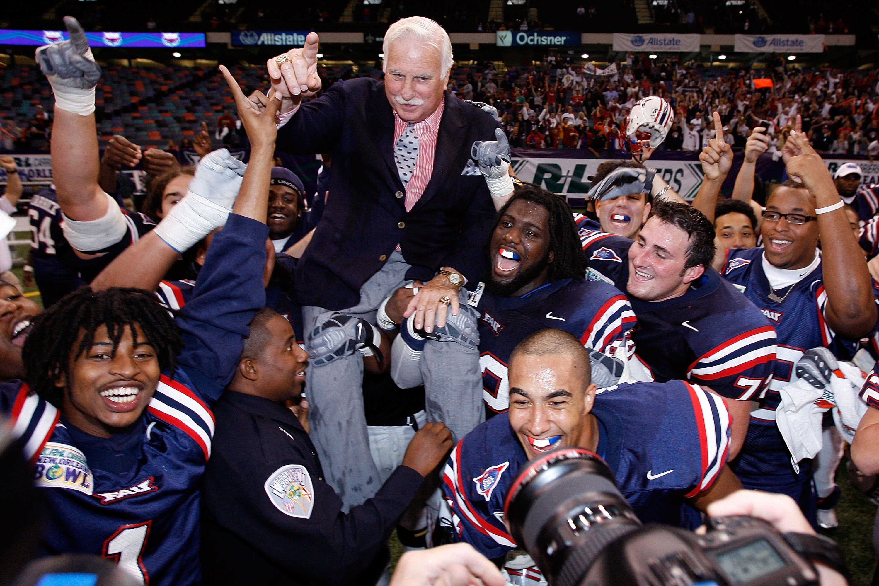NEW ORLEANS - DECEMBER 21:  Head coach Howard Schnellenberger of the Florida Atlantic University Owls is carried on his team's shoulders after defeating the Memphis University Tigers 44-27 in the New Orleans Bowl on December 21, 2007 at the Louisiana Supe