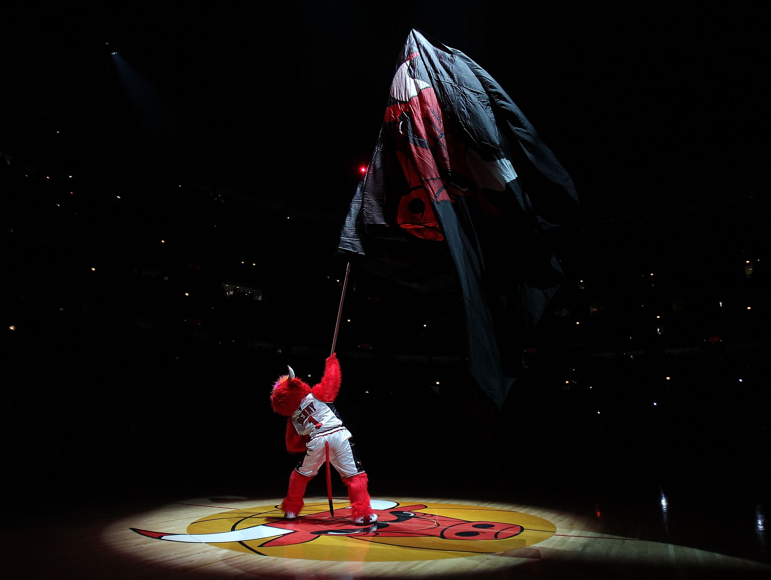 CHICAGO, IL - MARCH 07: Benny, the mascot of the Chicago Bulls, waves a flag before a game against the New Orleans Hornets at the United Center on March 7, 2011 in Chicago, Illinois. The Bulls defeated the Hornets 85-77. NOTE TO USER: User expressly ackno CHICAGO, IL - MARCH 07: Benny, the mascot of the Chicago Bulls, waves a flag before a game against the New Orleans Hornets at the United Center on March 7, 2011 in Chicago, Illinois. The Bulls defeated the Hornets 85-77. NOTE TO USER: User expressly ackno