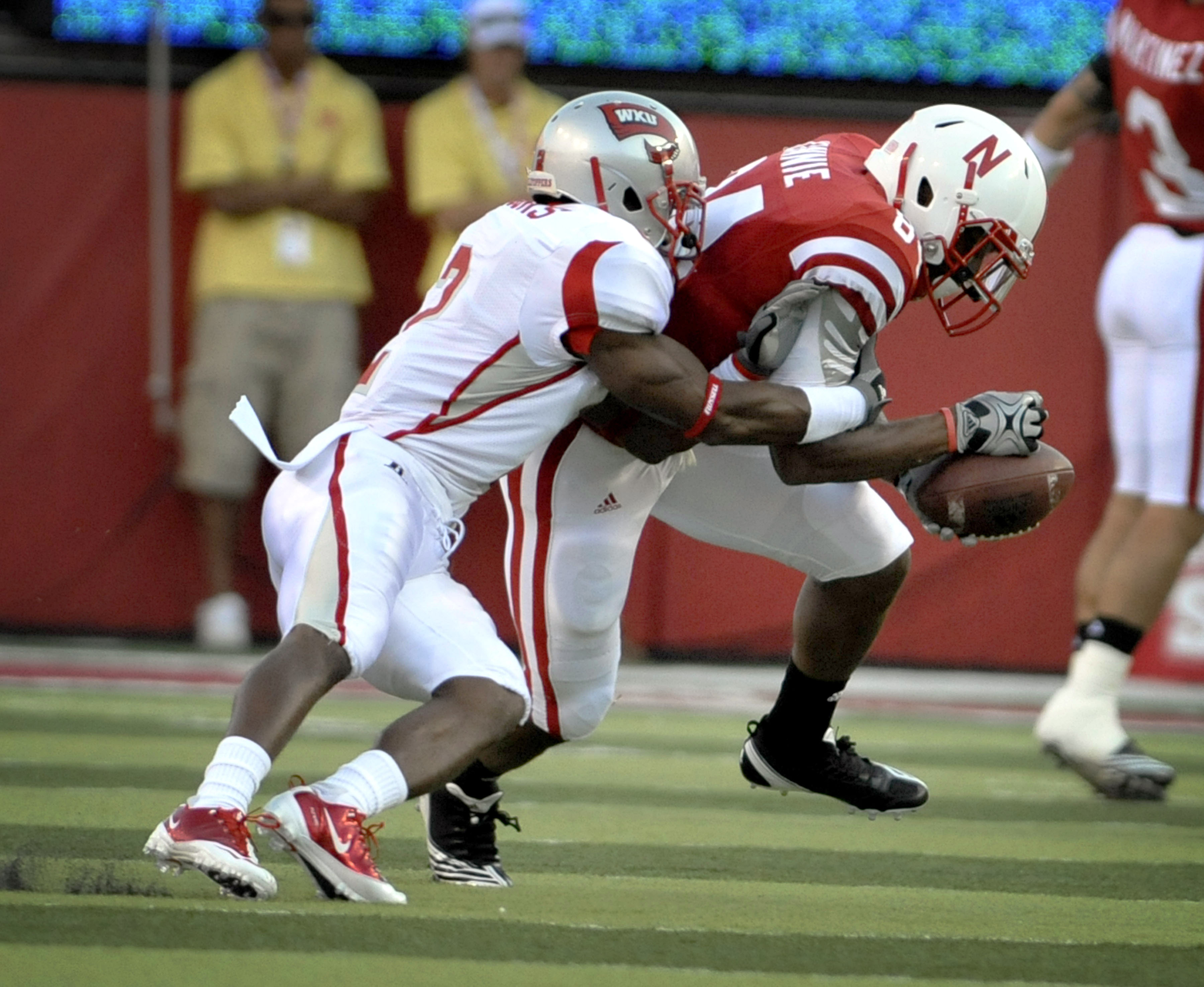 LINCOLN, NE - SEPTEMBER 04:  Brandon Kinnie #84 of the Nebraska Cornhuskers gets a pass knocked away by Derrius Brooks #2 of the Western Kentucky Hilltoppers during the first half at Memorial Stadium on September 4, 2010 in Lincoln, Nebraska.  (Photo by E