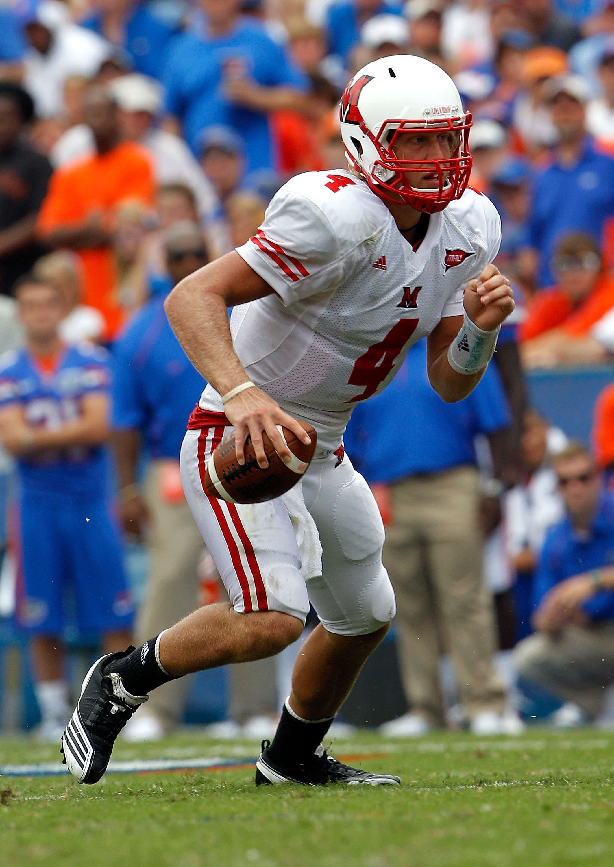 GAINESVILLE, FL - SEPTEMBER 04:  Quarterback Zac Dysert #4 of the Miami University RedHawks runs against the Florida Gators at Ben Hill Griffin Stadium on September 4, 2010 in Gainesville, Florida.  (Photo by Sam Greenwood/Getty Images)