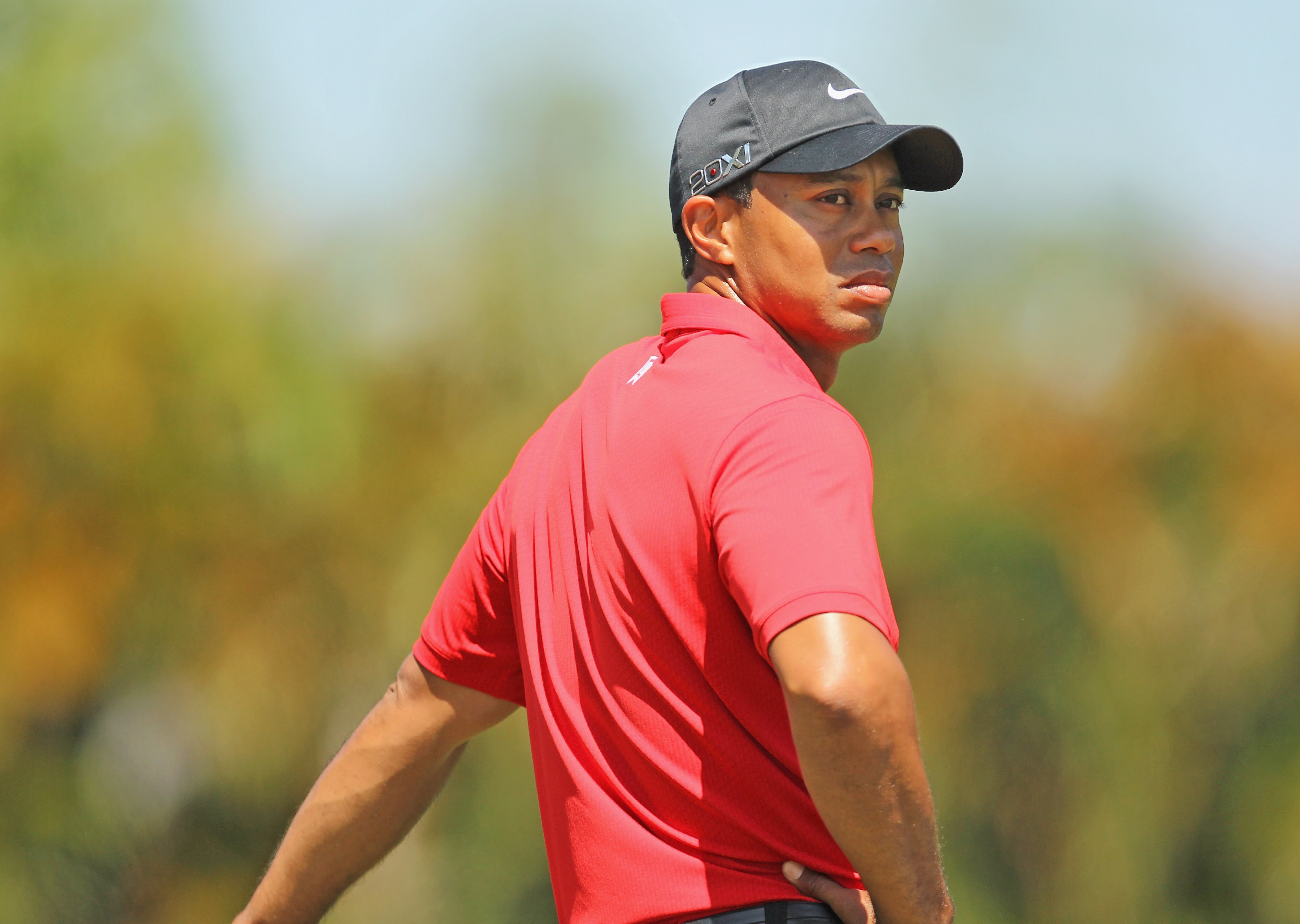 DORAL, FL - MARCH 13:  Tiger Woods waits on a tee box during the final round of the 2011 WGC- Cadillac Championship at the TPC Blue Monster at the Doral Golf Resort and Spa on March 13, 2011 in Doral, Florida.  (Photo by Mike Ehrmann/Getty Images)