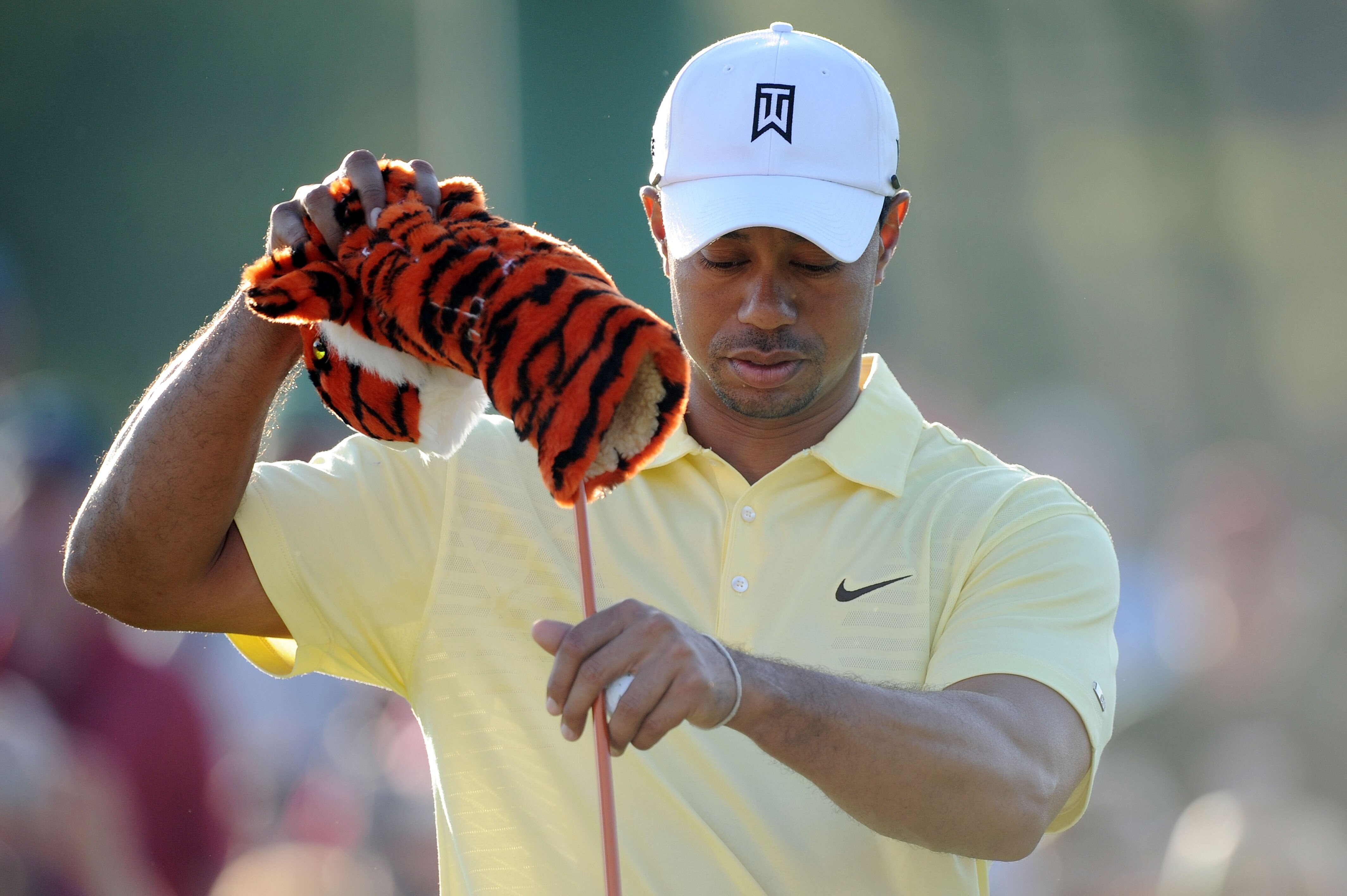 AUGUSTA, GA - APRIL 06:  Tiger Woods pulls his driver from his golf bag during a practice round prior to the 2010 Masters Tournament at Augusta National Golf Club on April 6, 2010 in Augusta, Georgia.  (Photo by Harry How/Getty Images)