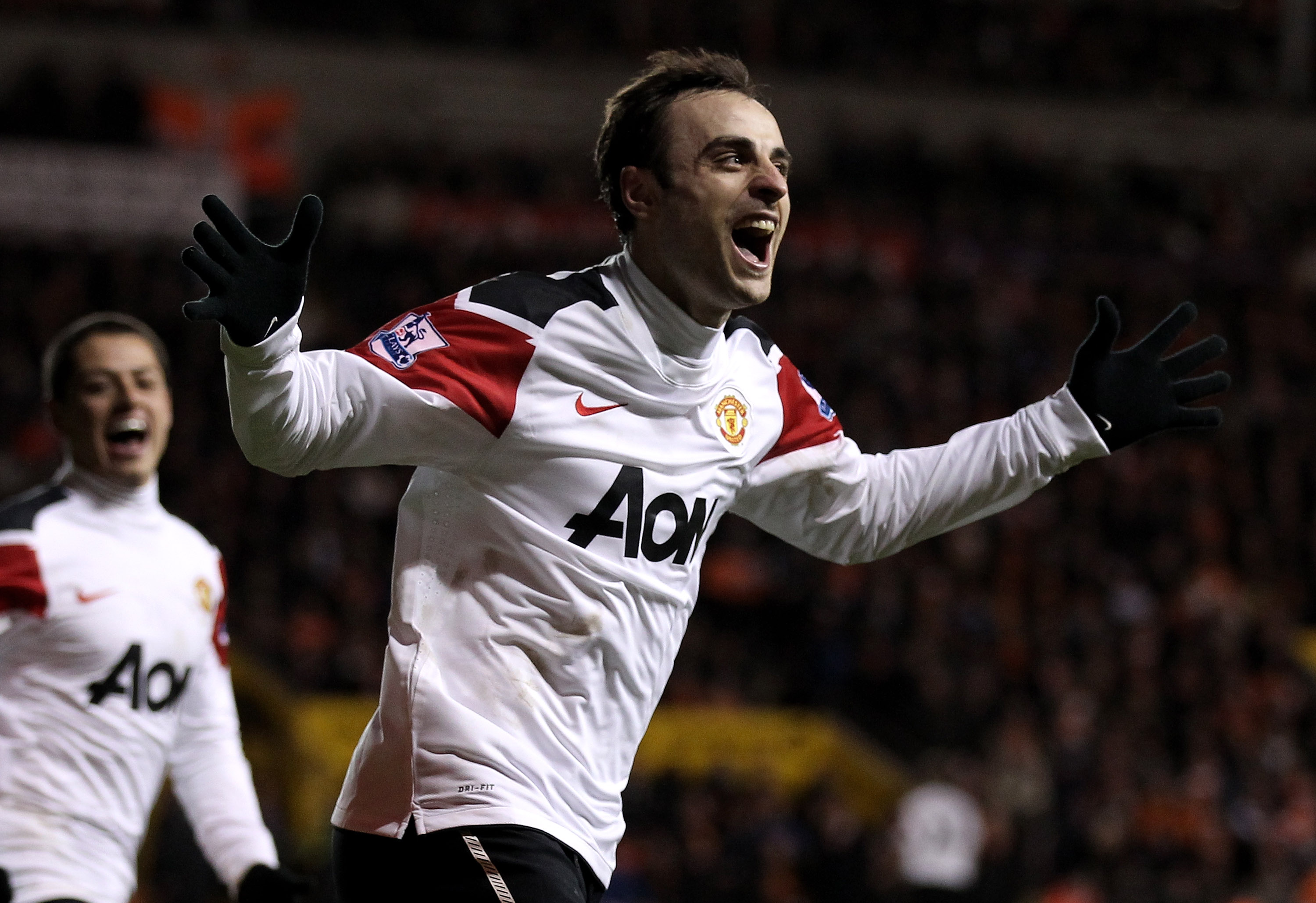 BLACKPOOL, ENGLAND - JANUARY 25:   Dimitar Berbatov of Manchester United celebrates scoring his team's third goal during the Barclays Premier League match between Blackpool and Manchester United at Bloomfield Road on January 25, 2011 in Blackpool, England