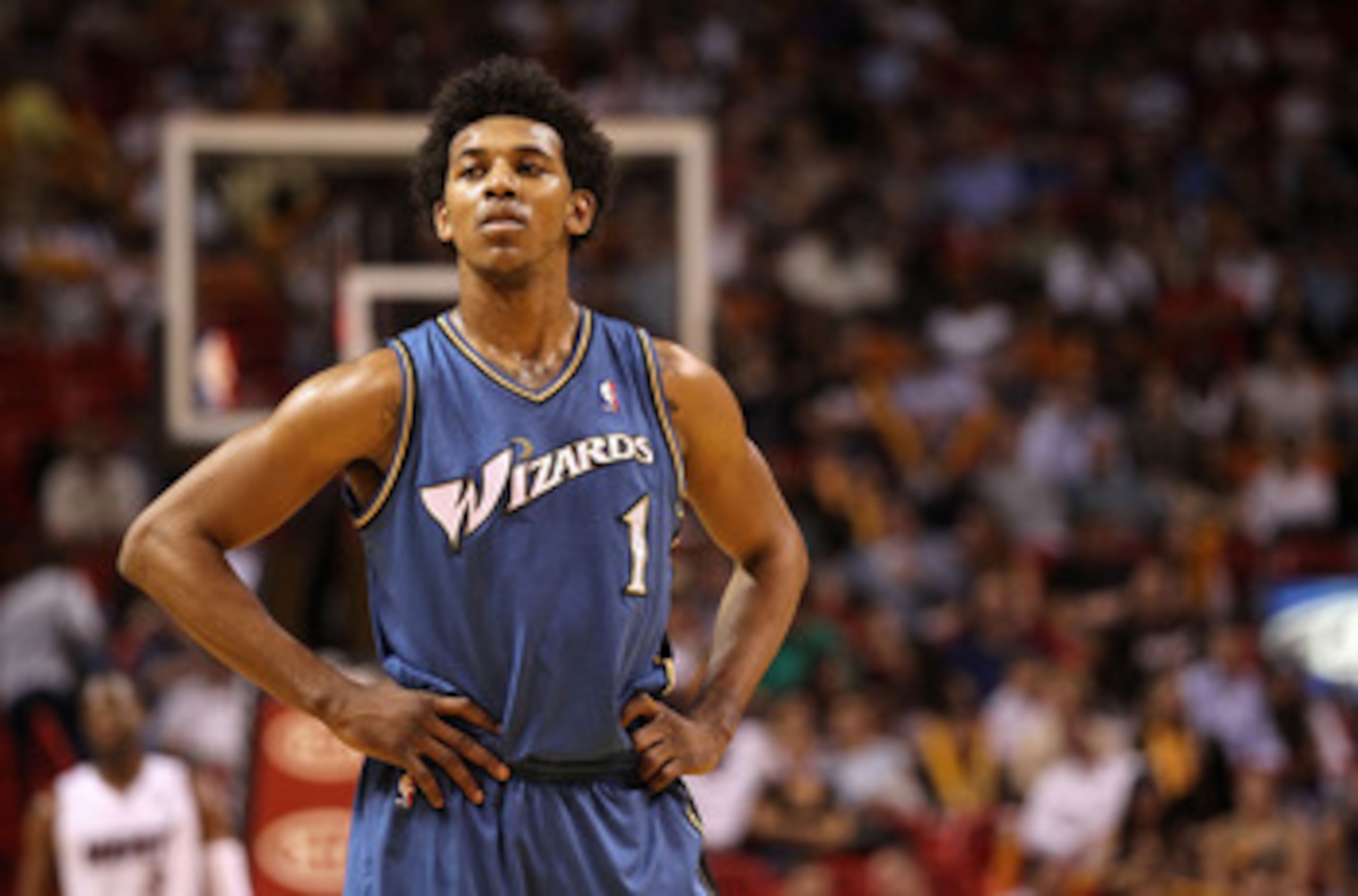 MIAMI, FL - FEBRUARY 25:  Nick Young #1 of the  Washington Wizards looks on during a pause in the game against the Miami Heat  at American Airlines Arena on February 25, 2011 in Miami, Florida. NOTE TO USER: User expressly acknowledges and agrees that, by