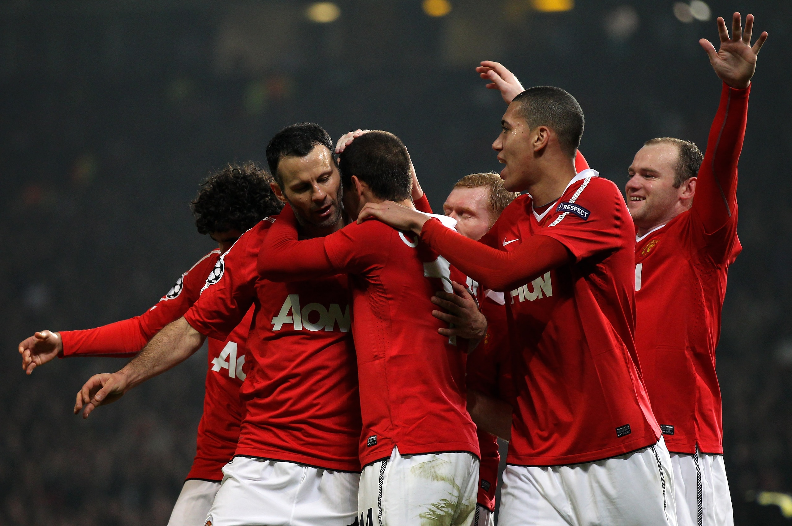 MANCHESTER, ENGLAND - MARCH 15:  Javier Hernandez (3L) of Manchester United celebrates with teammates after he scores the second goal during the UEFA Champions League round of 16 second leg match between Manchester United and Marseille at Old Trafford on 