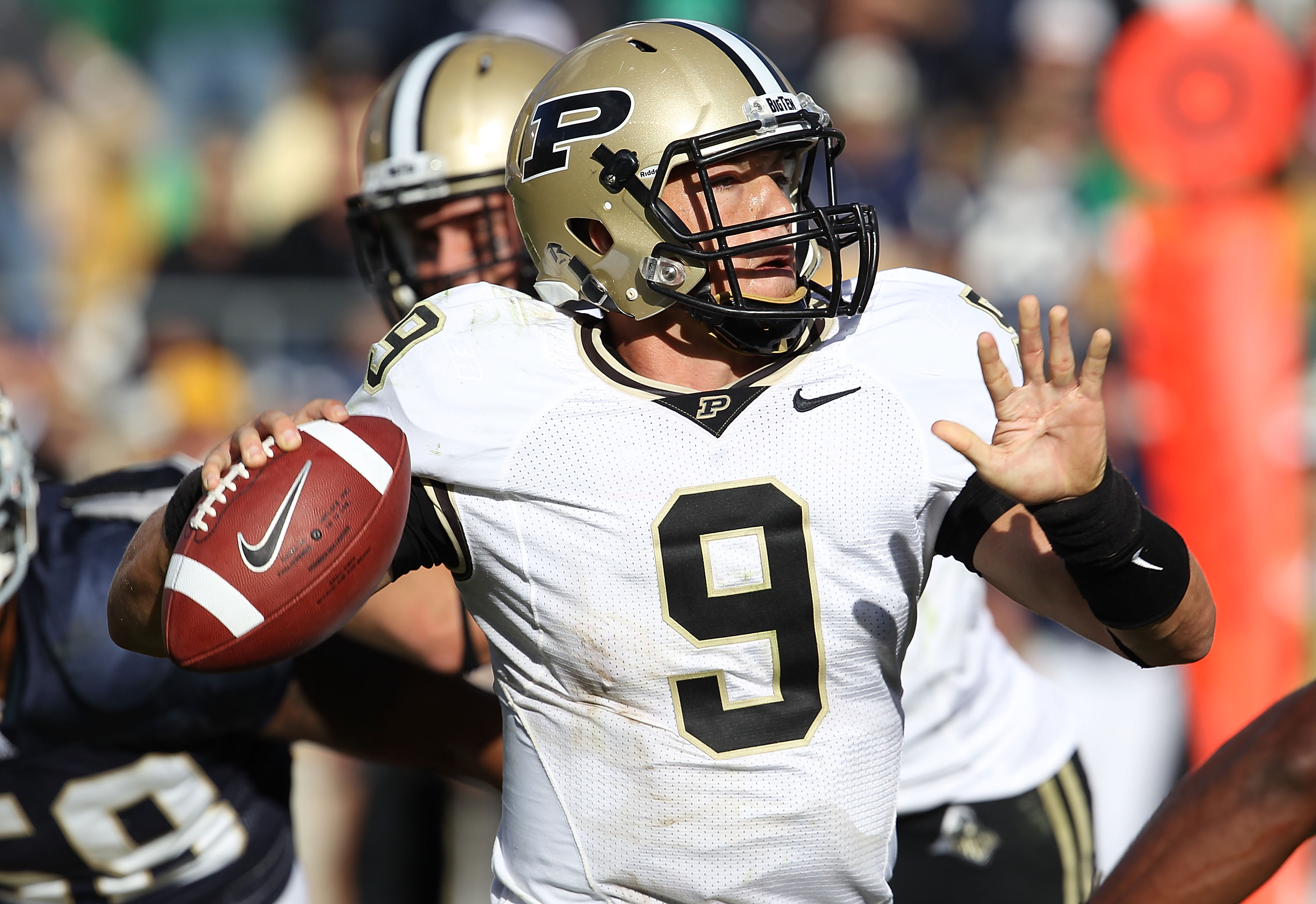 SOUTH BEND, IN - SEPTEMBER 04: Robert Marve #9 of the Purdue Boilermakers throws a pass against the Notre Dame Fighting Irish at Notre Dame Stadium on September 4, 2010 in South Bend, Indiana. Notre Dame defated Purdue 23-12. (Photo by Jonathan Daniel/Get