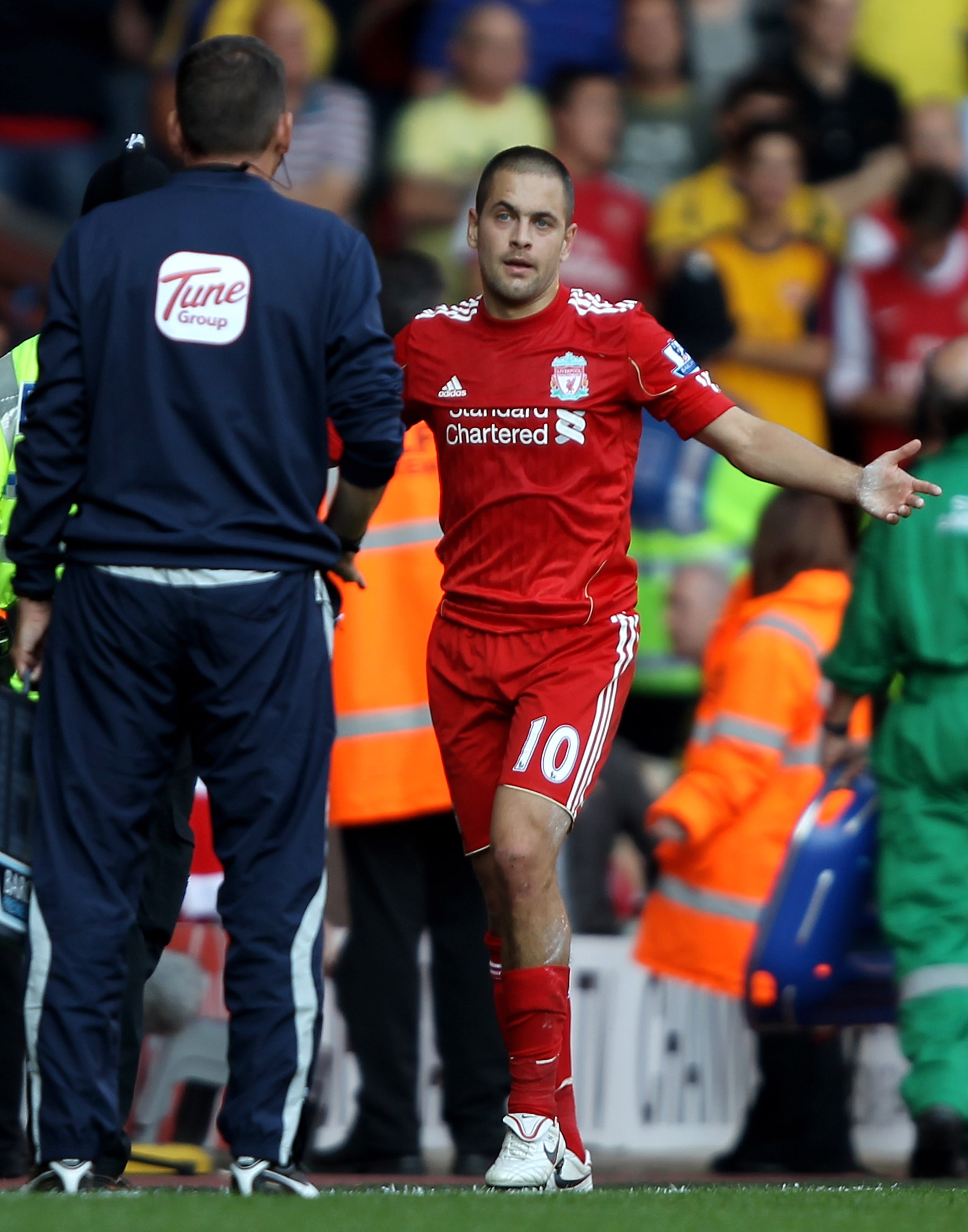 LIVERPOOL, ENGLAND - AUGUST 15:  Joe Cole of Liverpool reacts after being sent off during the Barclays Premier League match between Liverpool and Arsenal at Anfield on August 15, 2010 in Liverpool, England. (Photo by Clive Brunskill/Getty Images)