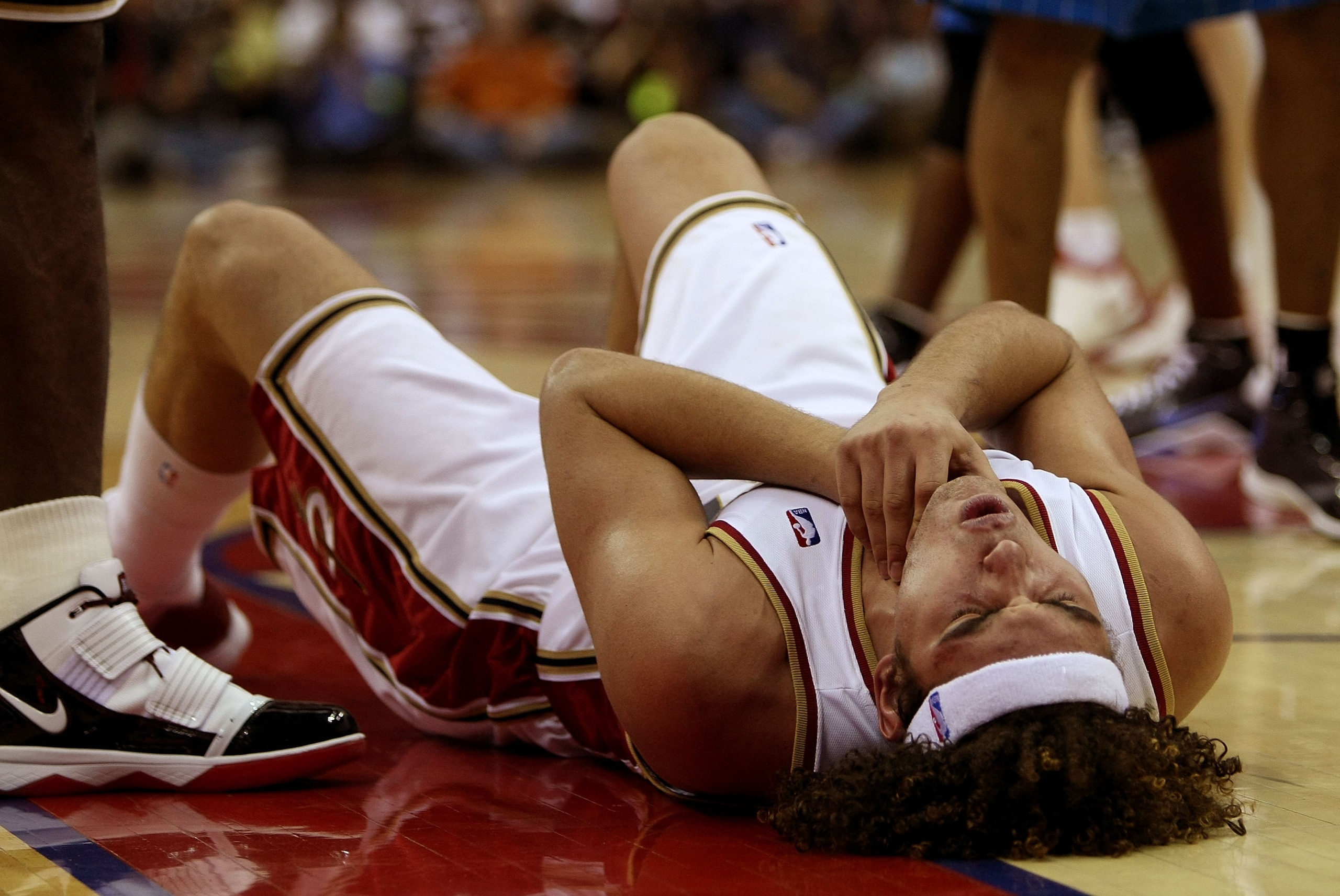 CLEVELAND - MAY 20: Anderson Varejao #17 of the Cleveland Cavaliers holds his throat after fighting for a loose ball against the Orlando Magic in Game One of the Eastern Conference Finals during the 2009 Playoffs at Quicken Loans Arena on May 20, 2009 in