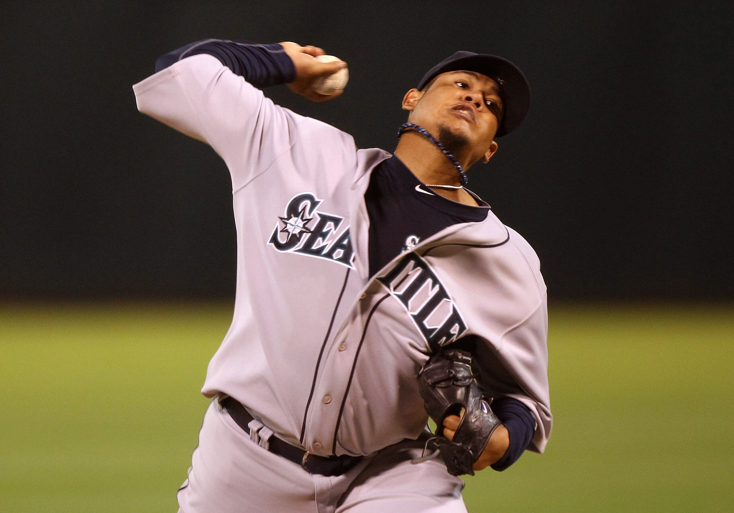OAKLAND, CA - APRIL 01:  Felix Hernandez #34 of the Seattle Mariners pitches against the Oakland Athletics during an opening day game of Major League Baseball at the Oakland-Alameda County Coliseum on April 1, 2011 in Oakland, California.  (Photo by Jed J
