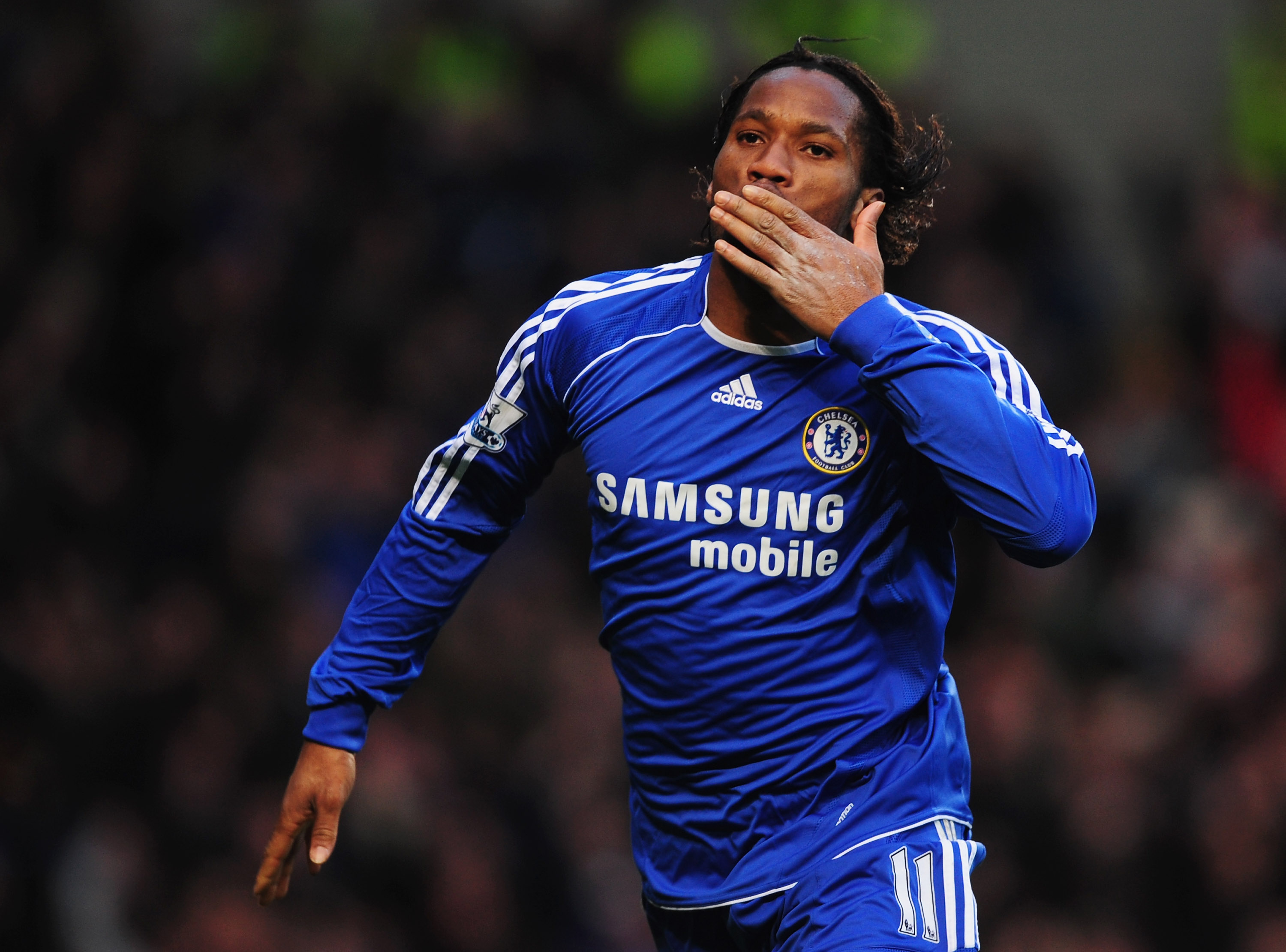 LONDON - MARCH 23:  Didier Drogba of Chelsea celebrates as he scores their second goal during the Barclays Premier League match between Chelsea and Arsenal at Stamford Bridge on March 23, 2008 in London, England.  (Photo by Shaun Botterill/Getty Images)