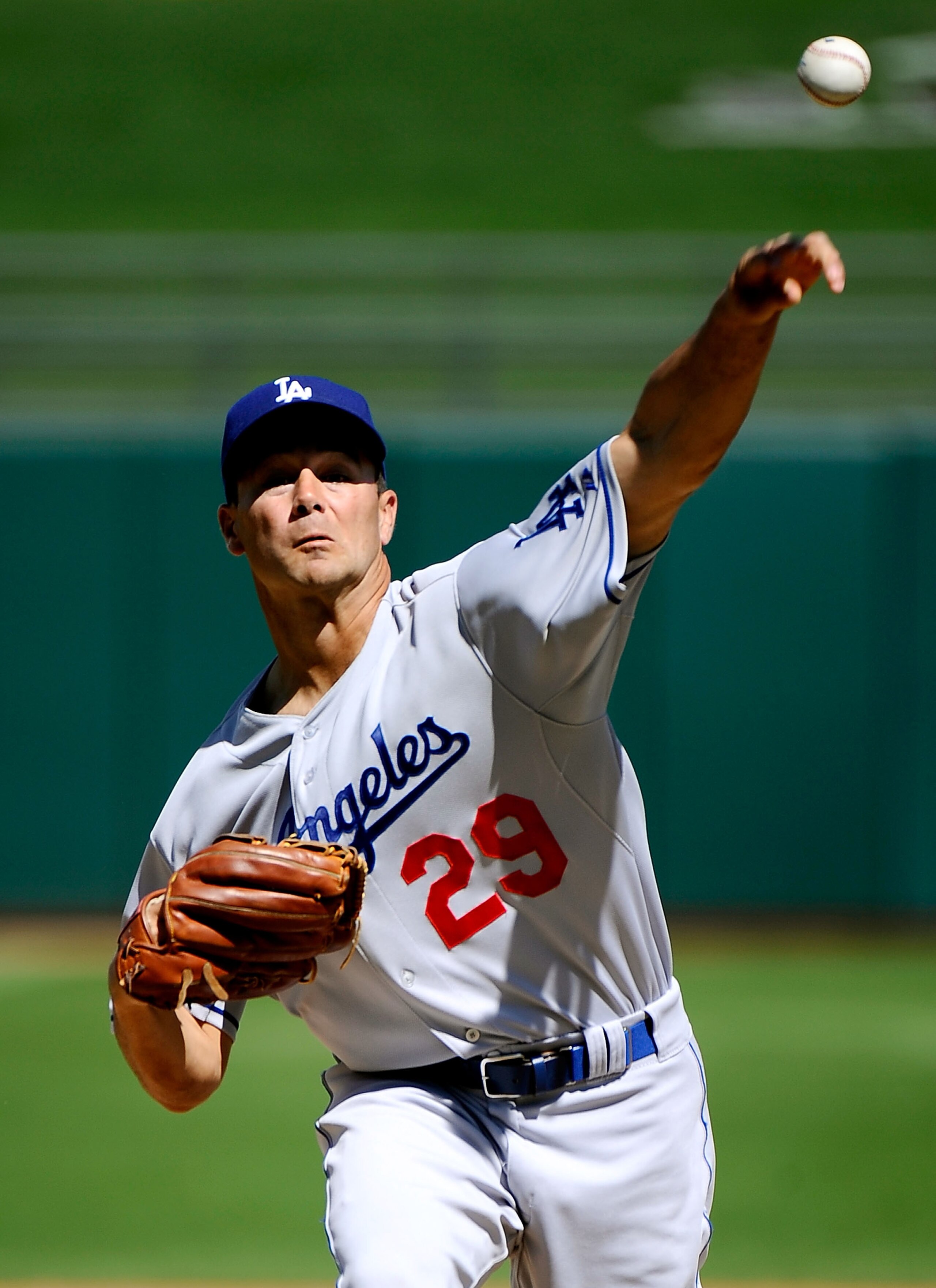 SURPRISE, AZ - MARCH 12:  Pitcher Ted Lilly #29 of the the Los Angeles Dodgers  throws a pitch during the spring training baseball game against the Kansas City Royals at Surprise Stadium on March 12, 2011 in Surprise, Arizona.  (Photo by Kevork Djansezian