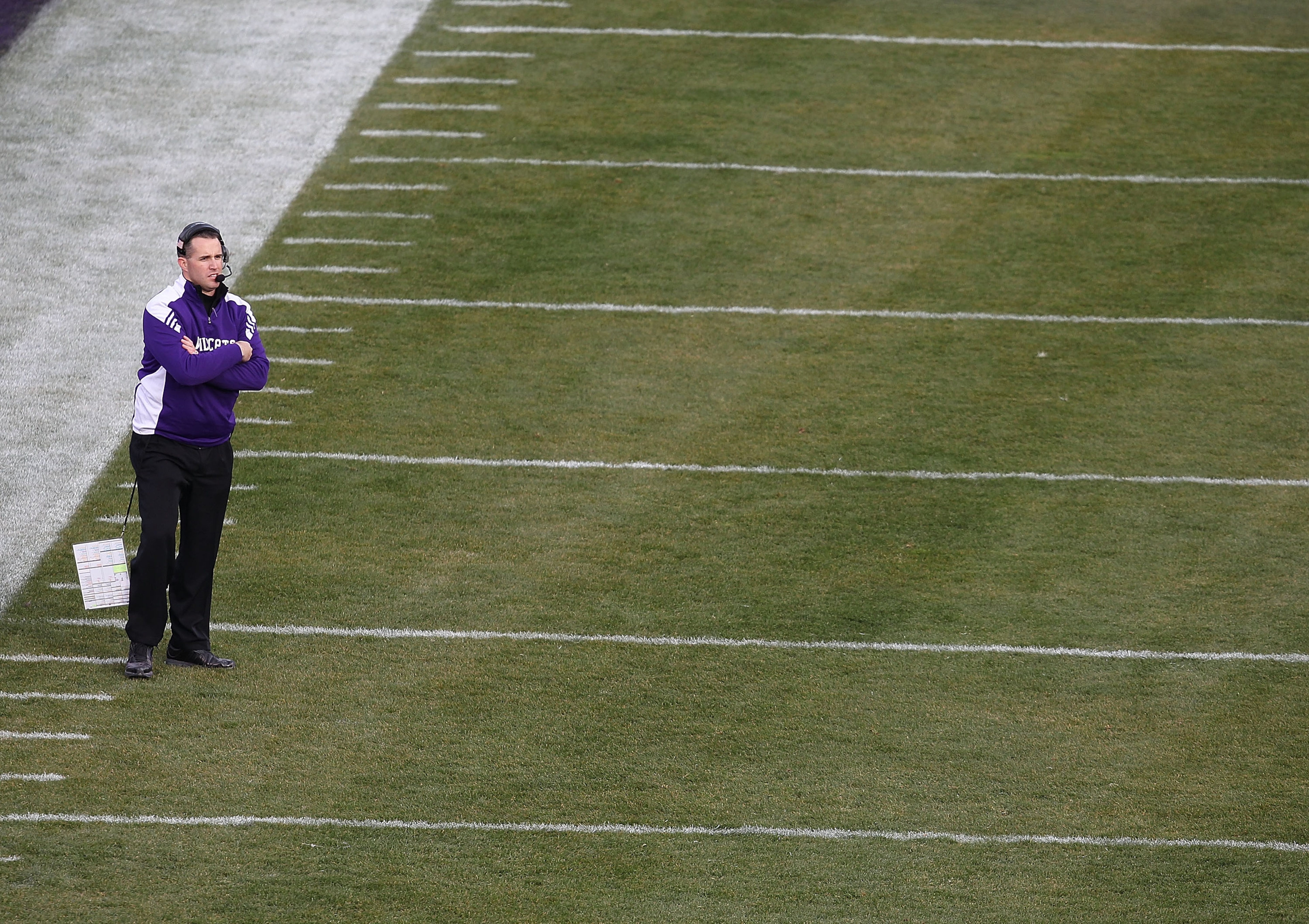 CHICAGO - NOVEMBER 20: Head coach Pat Fitzgerald of the Northwestern Wildcats watches as his team takes on the Illinois Fighting Illini during a game played at Wrigley Field on November 20, 2010 in Chicago, Illinois. (Photo by Jonathan Daniel/Getty Images