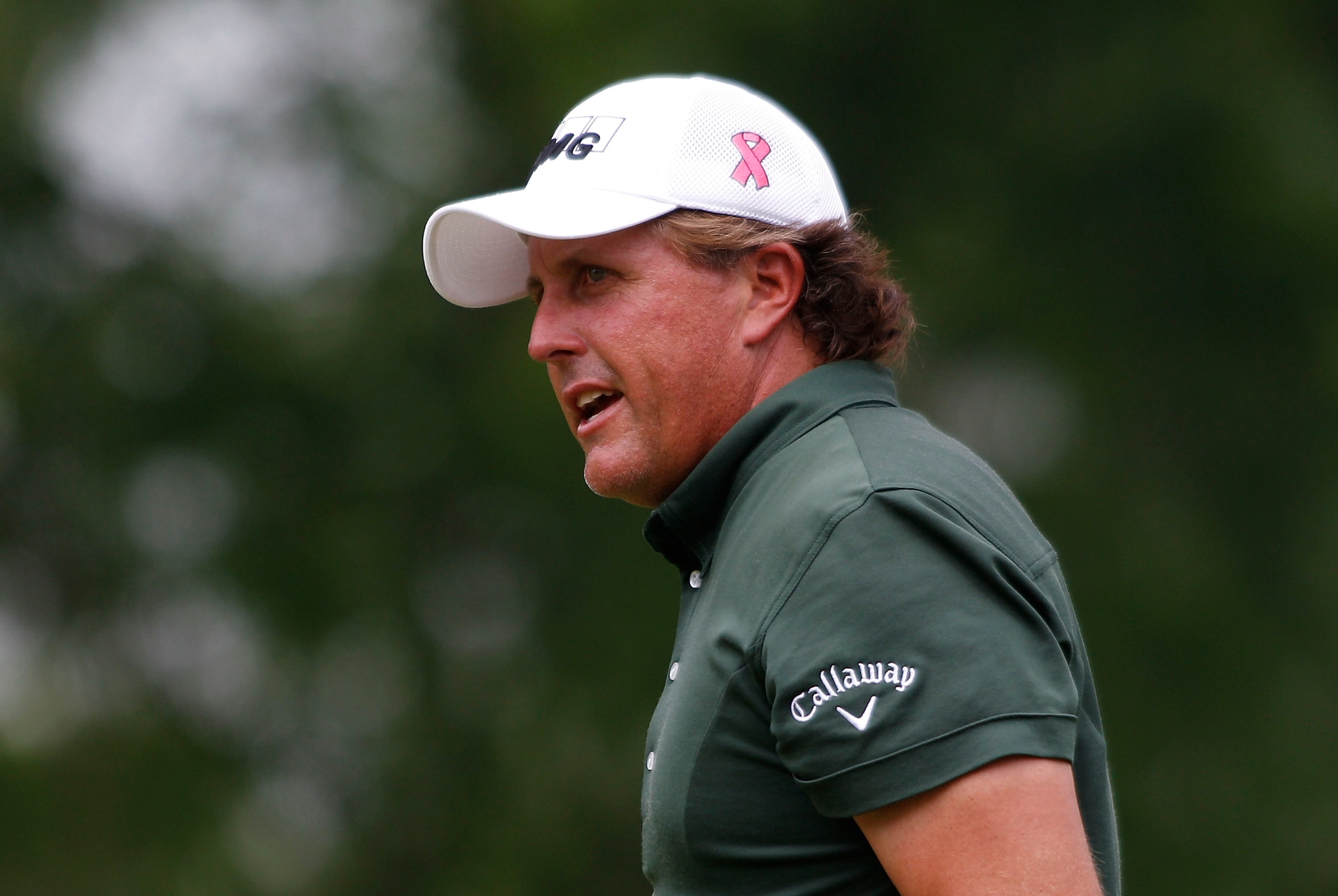 HUMBLE, TX - APRIL 02: Phil Mickelson celebrates his birdie on the 13th green during the third round of the Shell Houston Open at Redstone Golf Club on April 2, 2011 in Humble, Texas. (Photo by Michael Cohen/Getty Images) HUMBLE, TX - APRIL 02: Phil Mickelson celebrates his birdie on the 13th green during the third round of the Shell Houston Open at Redstone Golf Club on April 2, 2011 in Humble, Texas. (Photo by Michael Cohen/Getty Images)