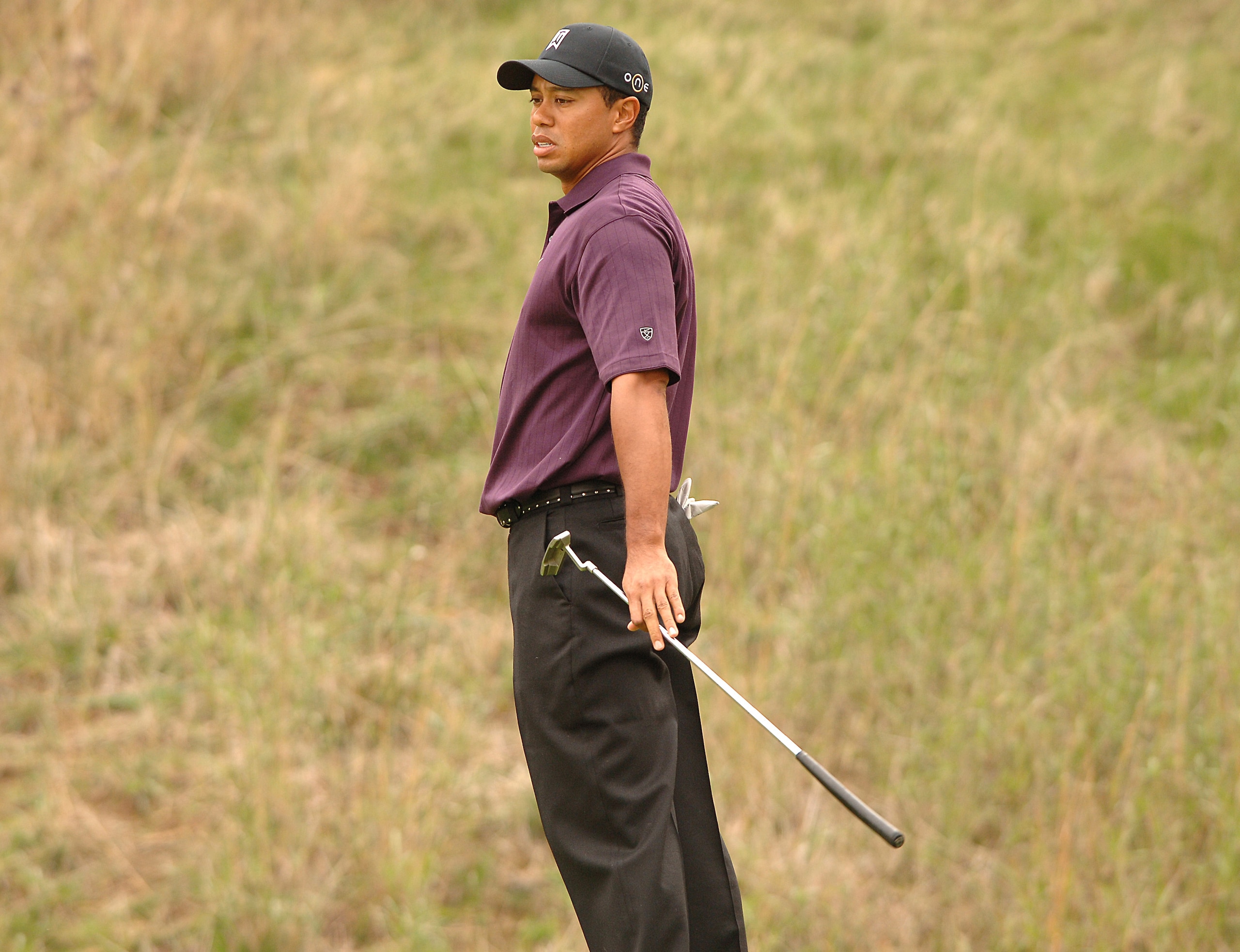 UNITED STATES - DECEMBER 08:  Tiger Woods reacts to a missed putt on the 8th green during the first round of the Target World Challenge Presented by Countrywide at the Sherwood Country Club in Thousand Oaks, California December 8, 2005.  (Photo by Steve G