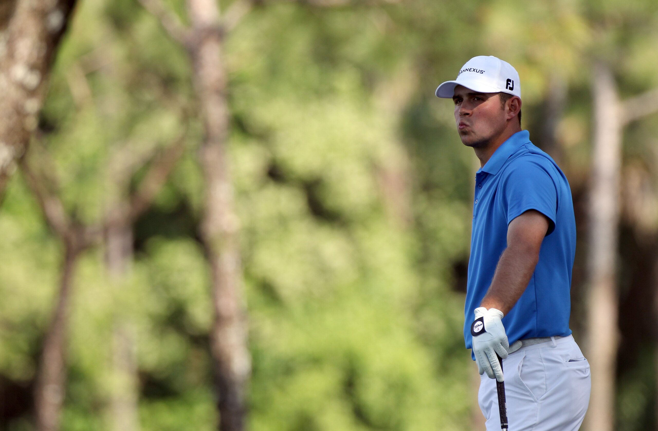 PALM HARBOR, FL - MARCH 20:  Gary Woodland plays a shot on the 14th hole during the final round of the Transitions Championship at Innisbrook Resort and Golf Club on March 20, 2011 in Palm Harbor, Florida.  (Photo by Sam Greenwood/Getty Images)