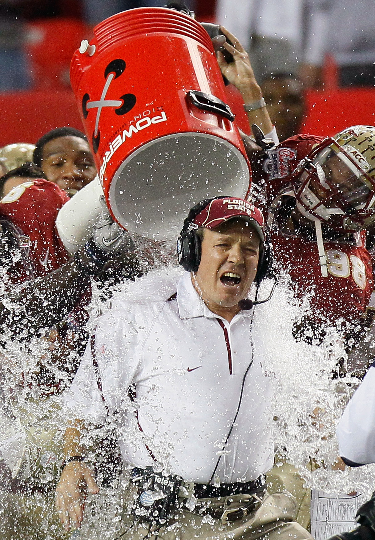 ATLANTA, GA - DECEMBER 31:  Head coach JimboFisher of the Florida State Seminoles is doused with water in the final seconds of their 26-17 win over the South Carolina Gamecocks during the 2010 Chick-fil-A Bowl at Georgia Dome on December 31, 2010 in Atlan