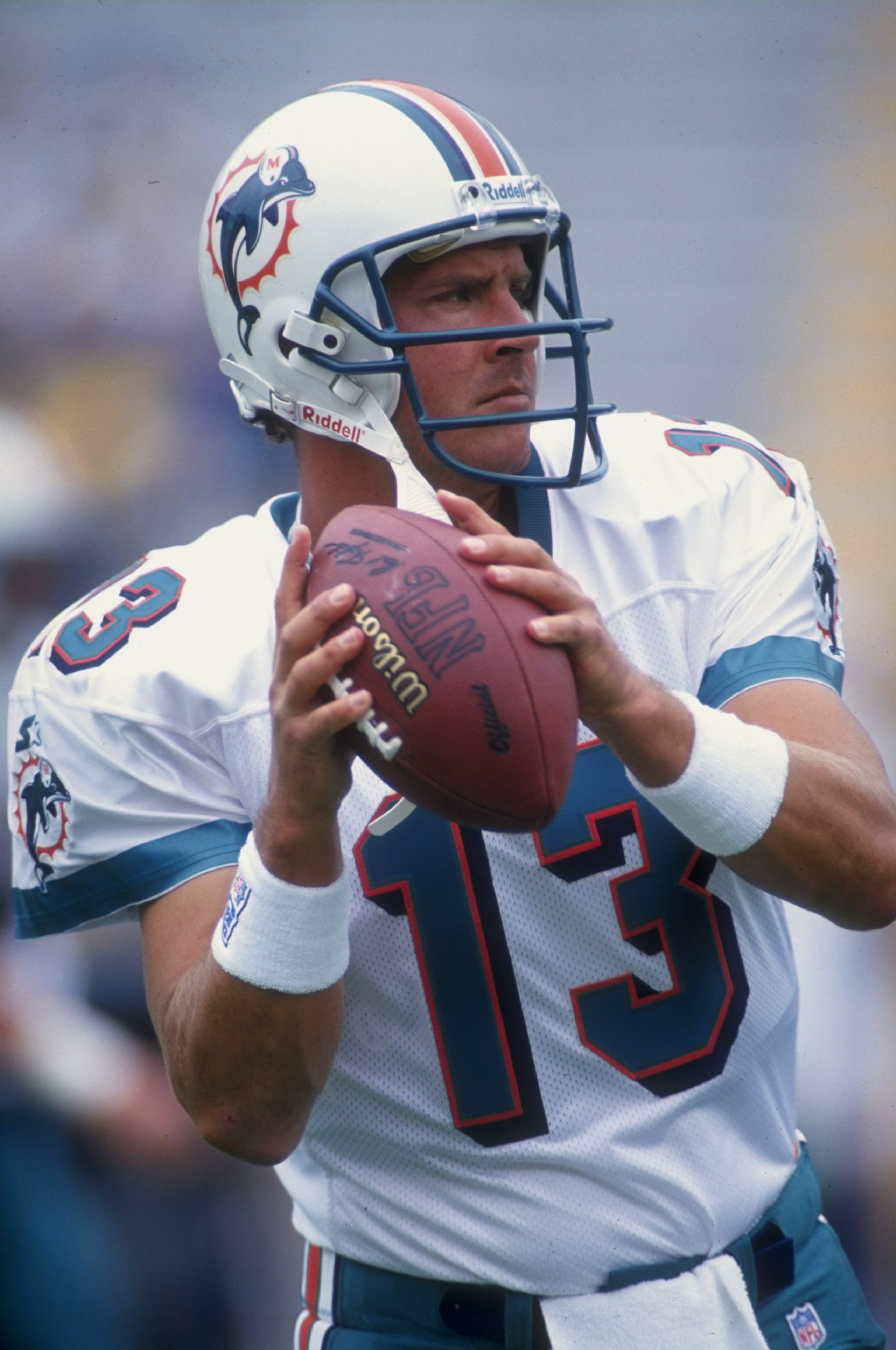 14 Sep 1997:  Quarterback Dan Marino of the Miami Dolphins warms up during the Dolphins 23-18 loss to the Green Bay Packers at Lambeau Field in Green Bay, Wisconsin. Mandatory Credit: Harry How  /Allsport