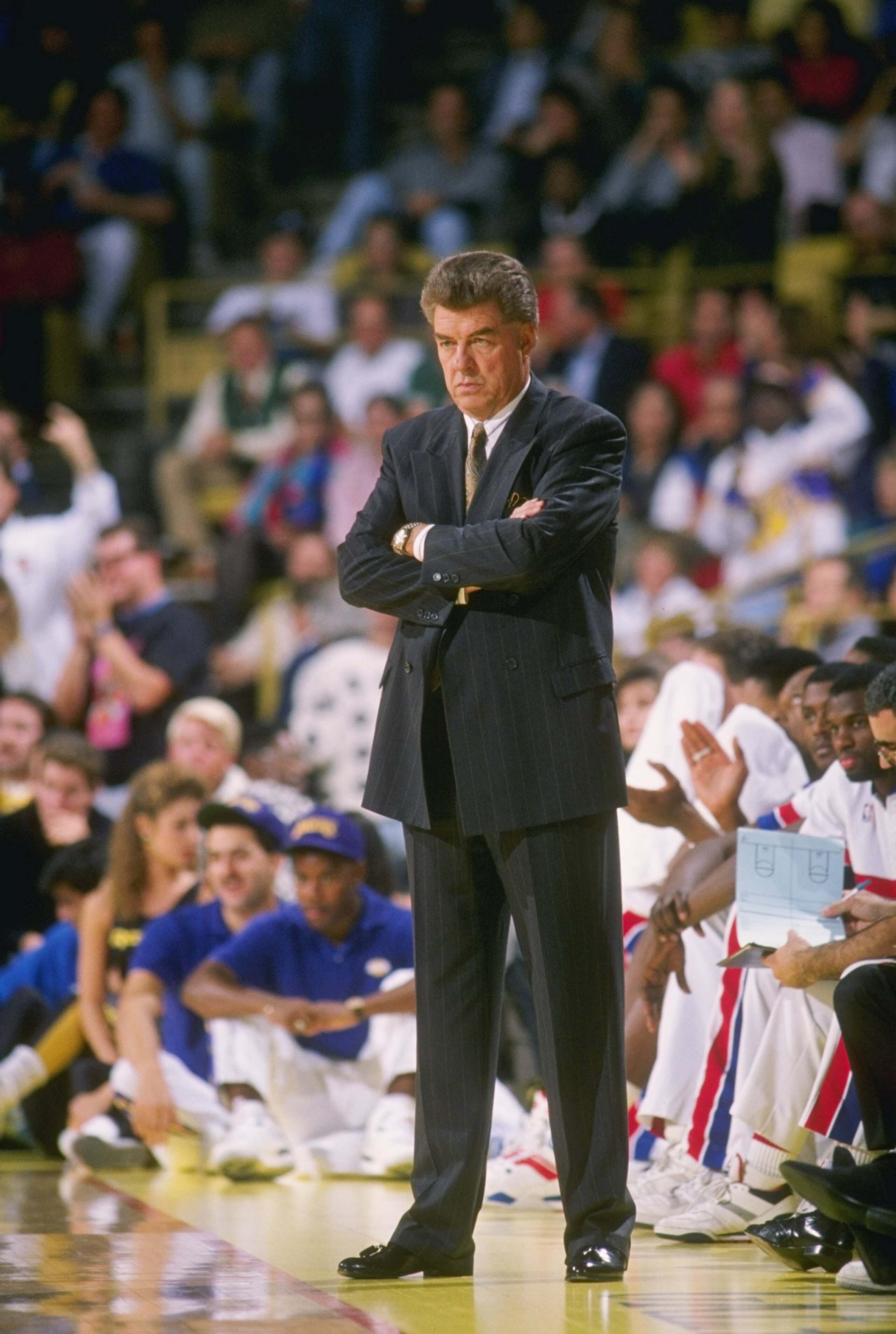1989:  Head coach Chuck Daly of the Detroit Pistons stands on the sidelines during a game. Mandatory Credit: Mike Powell  /Allsport